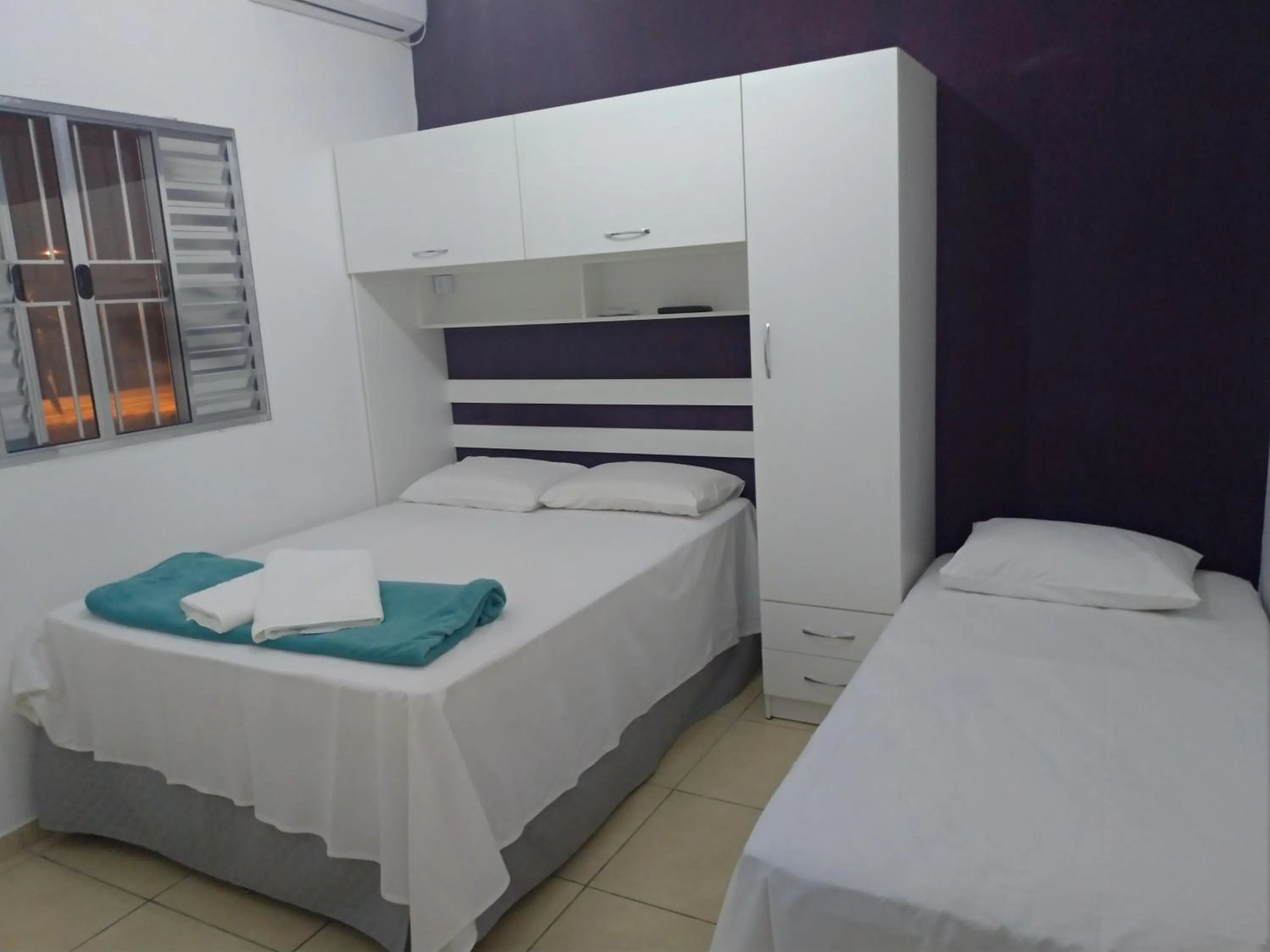 Bed in Pousada Lirio dos Vales