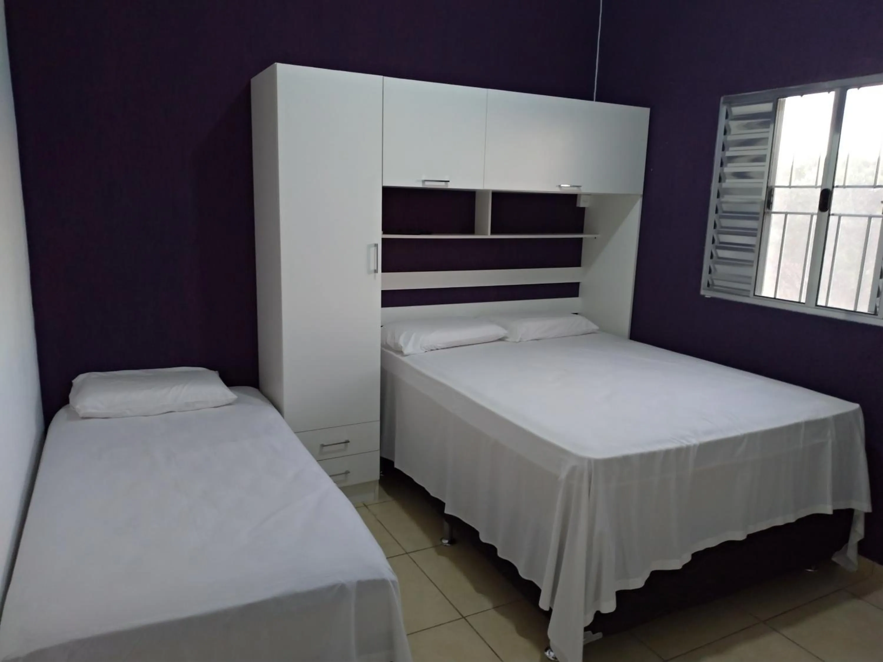 Bed in Pousada Lirio dos Vales