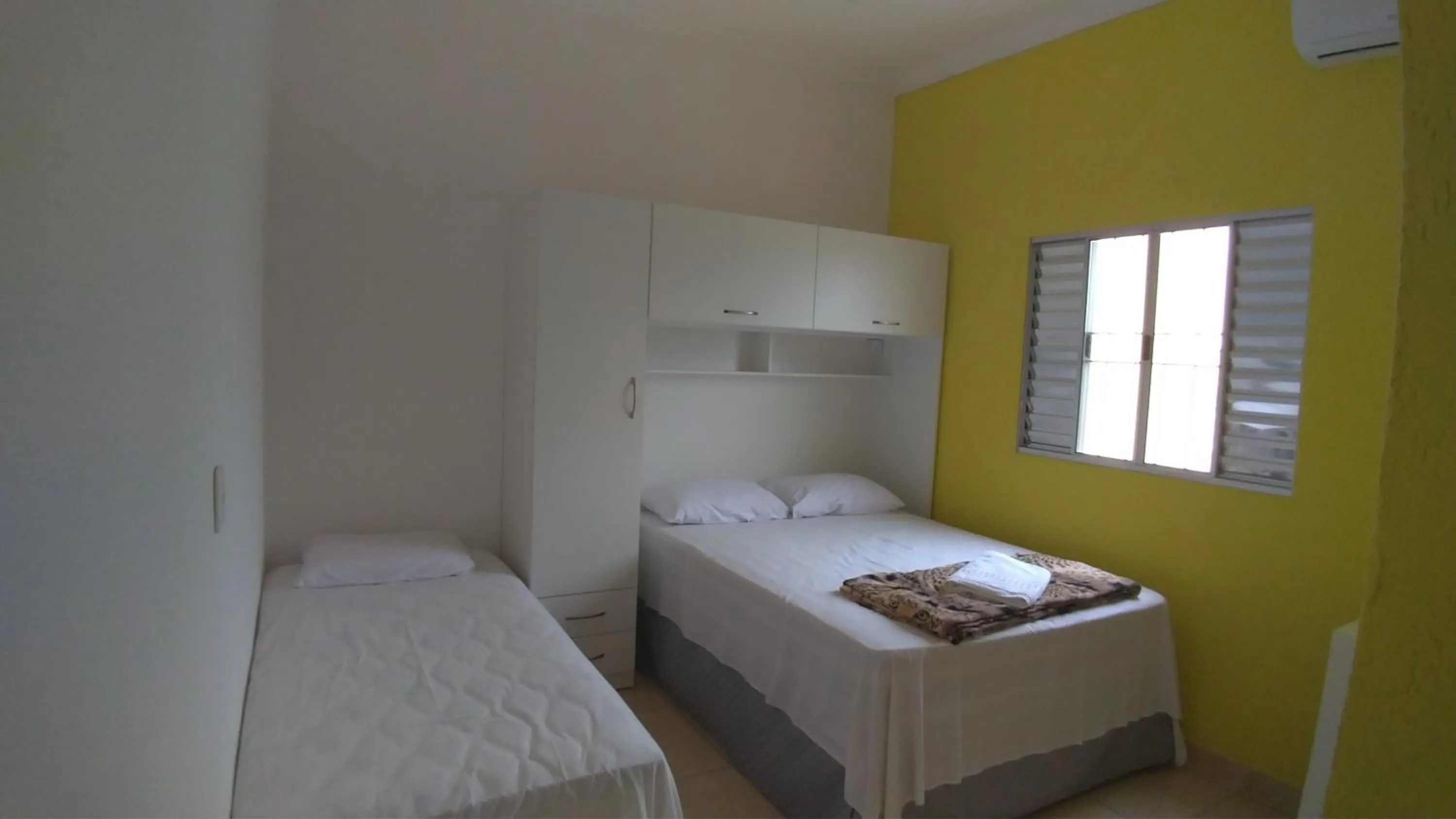 Bed in Pousada Lirio dos Vales