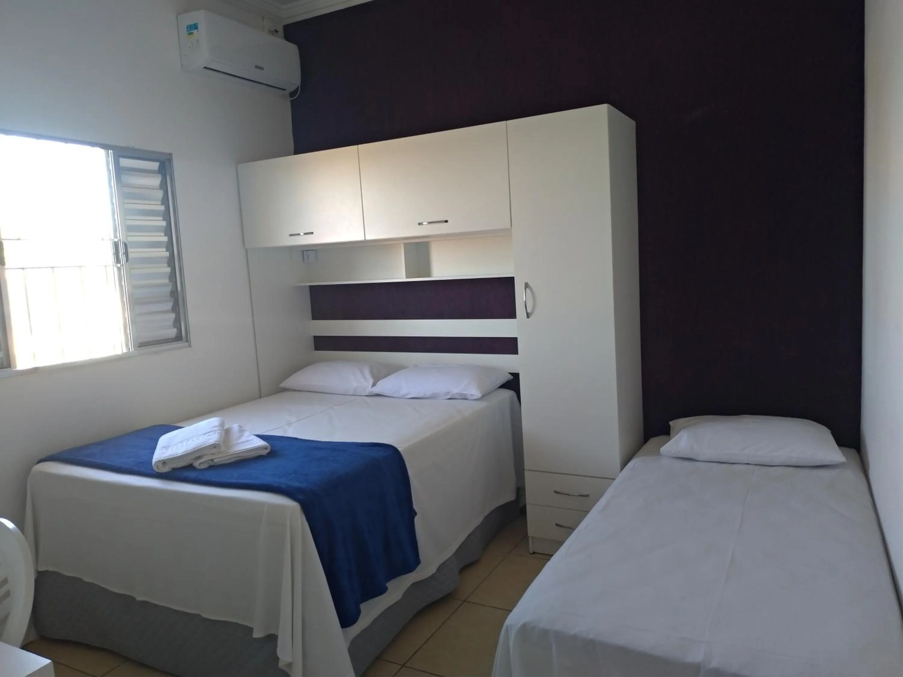 Bed in Pousada Lirio dos Vales