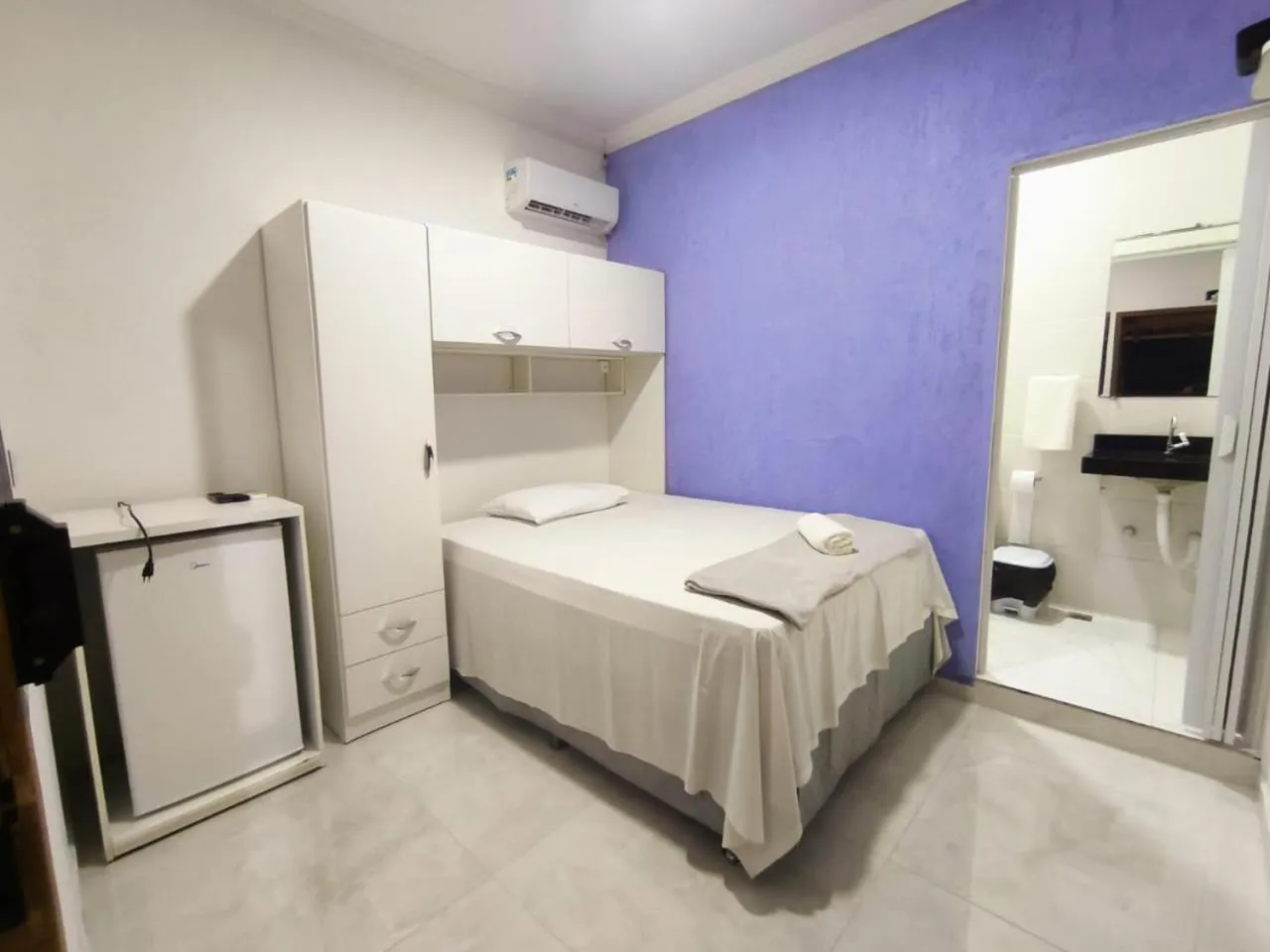 Bed in Pousada Lirio dos Vales