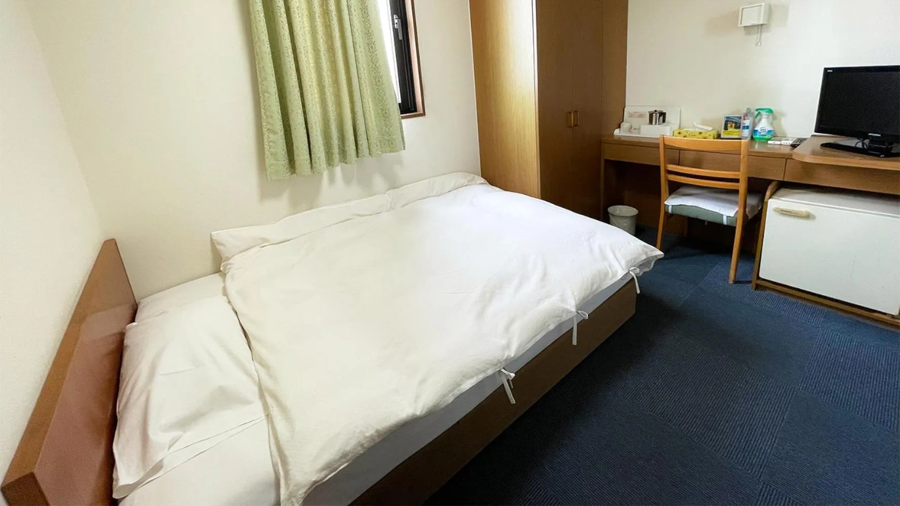 Bed in Business Hotel Rupinasu