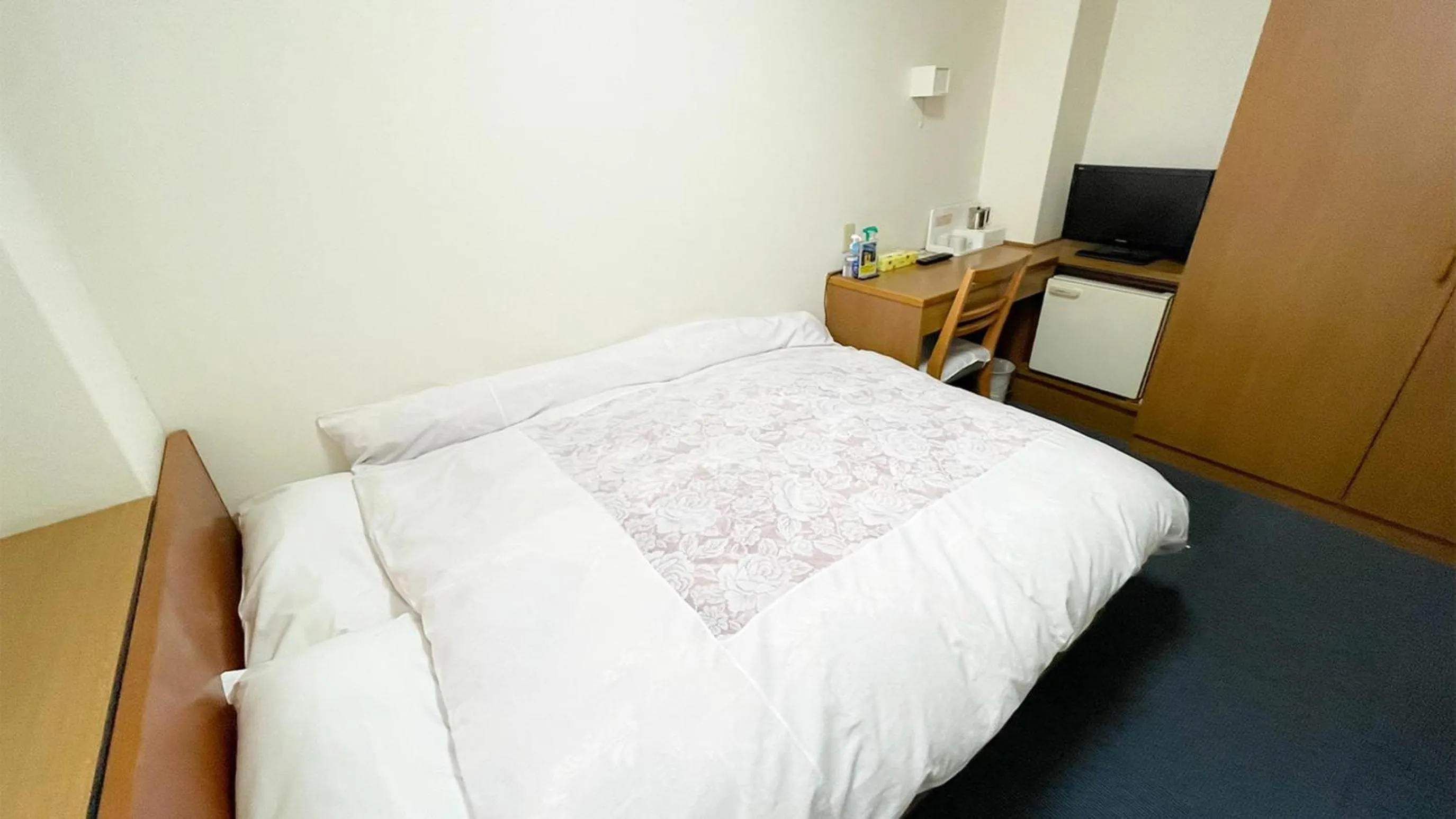 Bed in Business Hotel Rupinasu