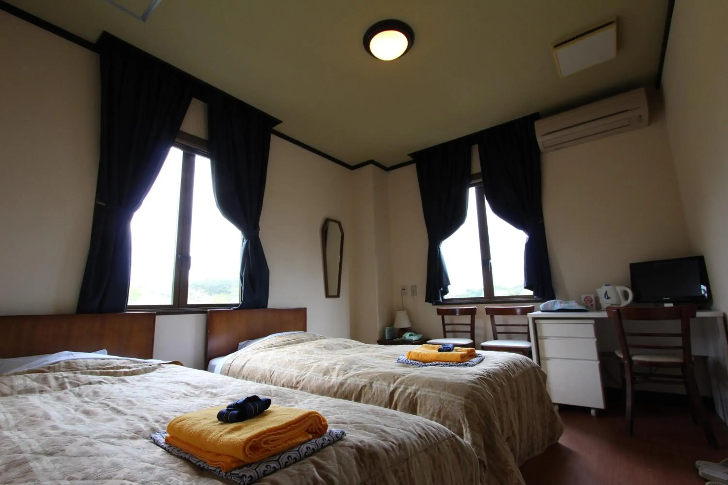 Twin Room in Matsushima Petit Hotel Bistro Abalon Twin Room in Matsushima Petit Hotel Bistro Abalon