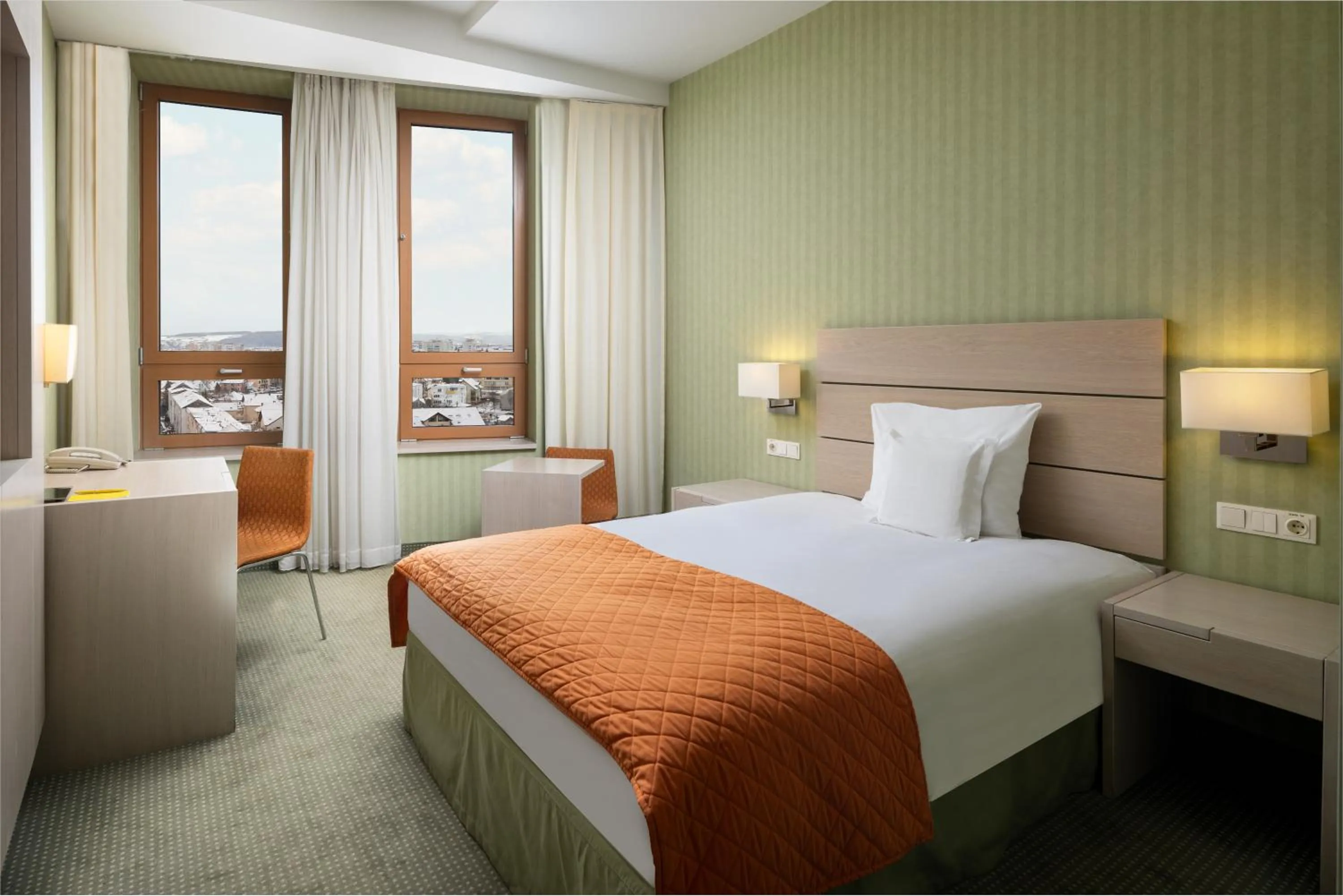 View (from property/room), Bed in Hotel Golden Tulip Ana Tower Sibiu