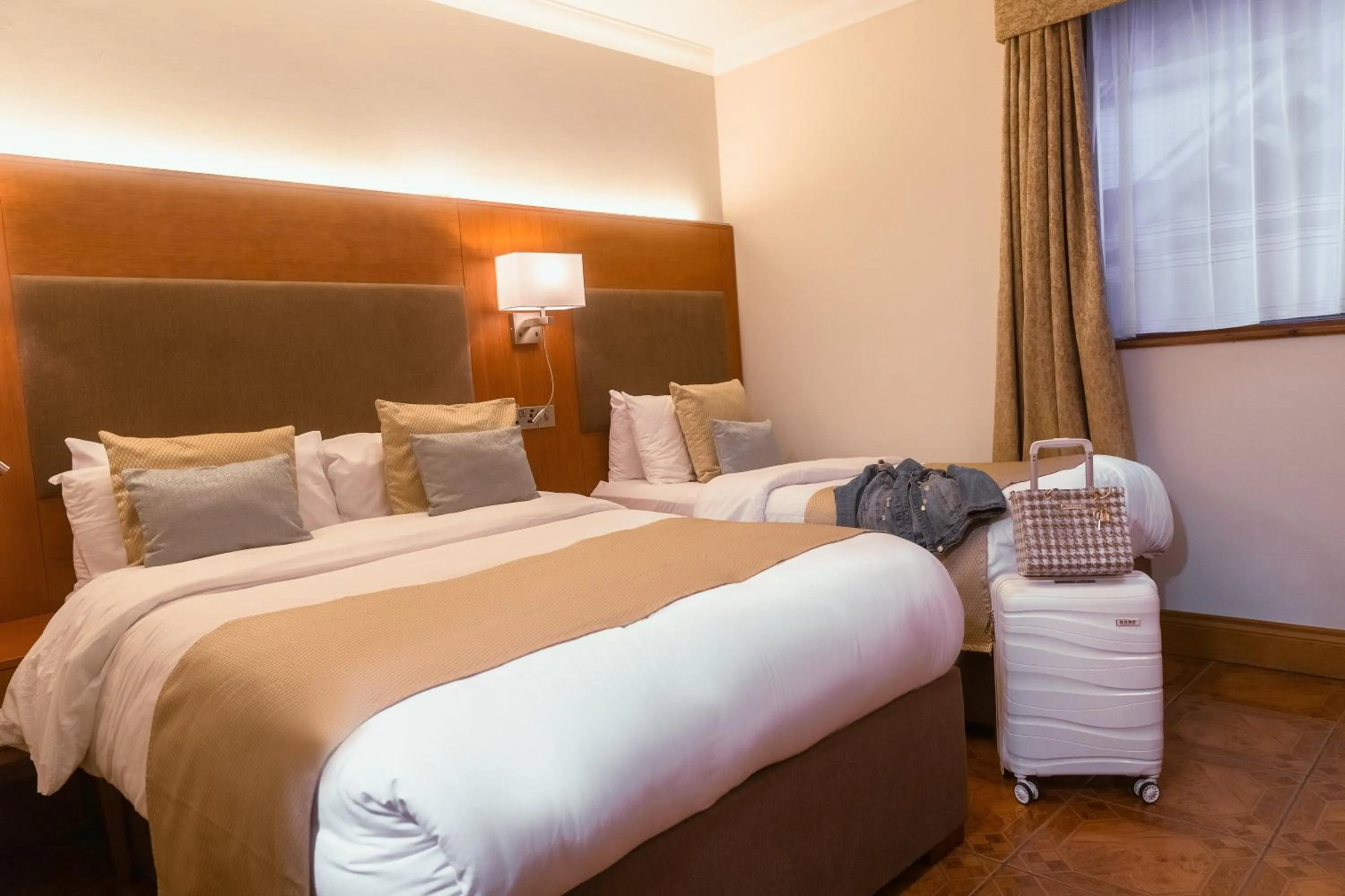 Bed in Uppercross House Hotel