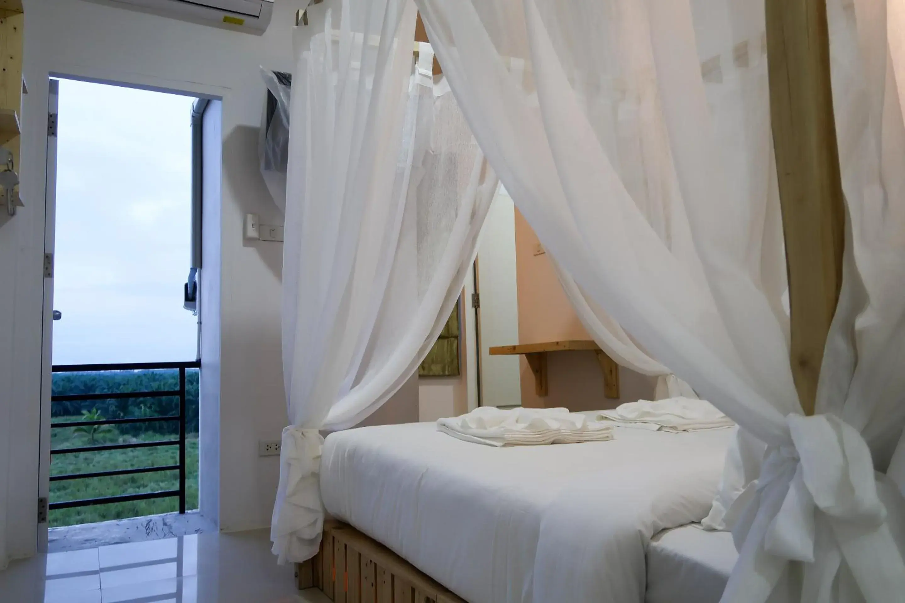 View (from property/room), Bed in Baan URT Suratthani Airport Hotel View (from property/room), Bed in Baan URT Suratthani Airport Hotel