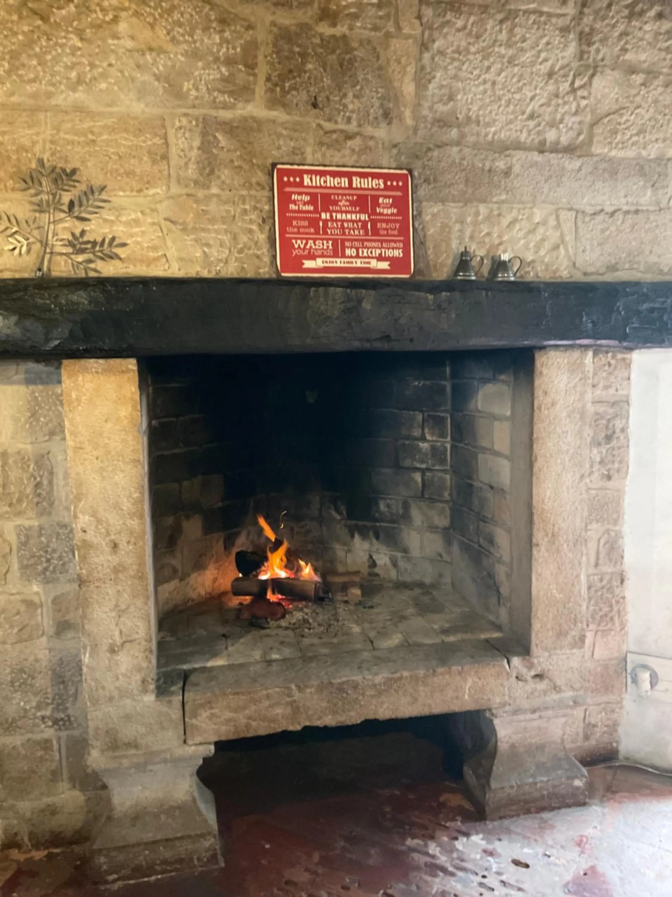 fireplace in The Literary Man Obidos Hotel