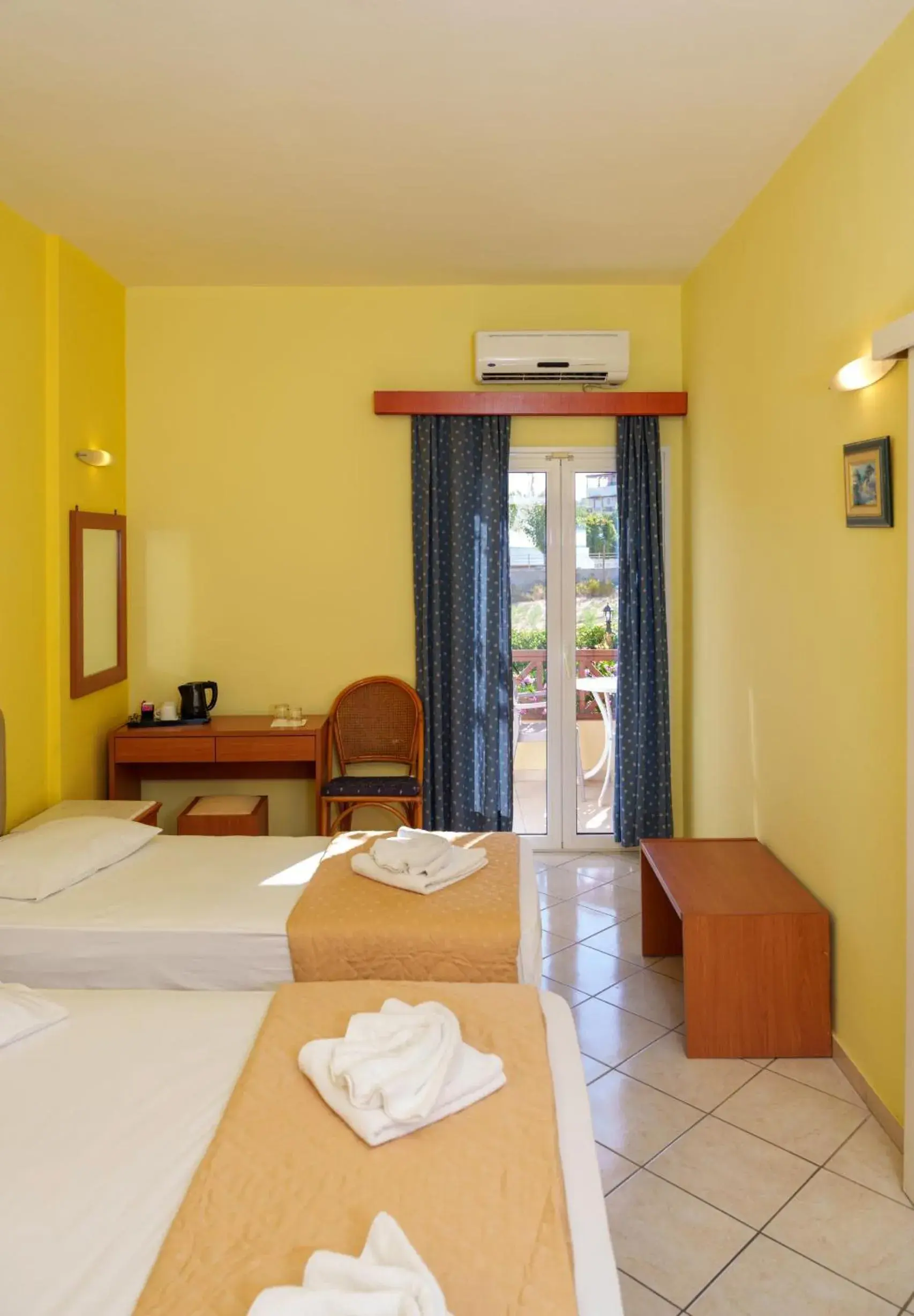 Triple Room with Garden View in Dedalos Beach Hotel Triple Room with Garden View in Dedalos Beach Hotel