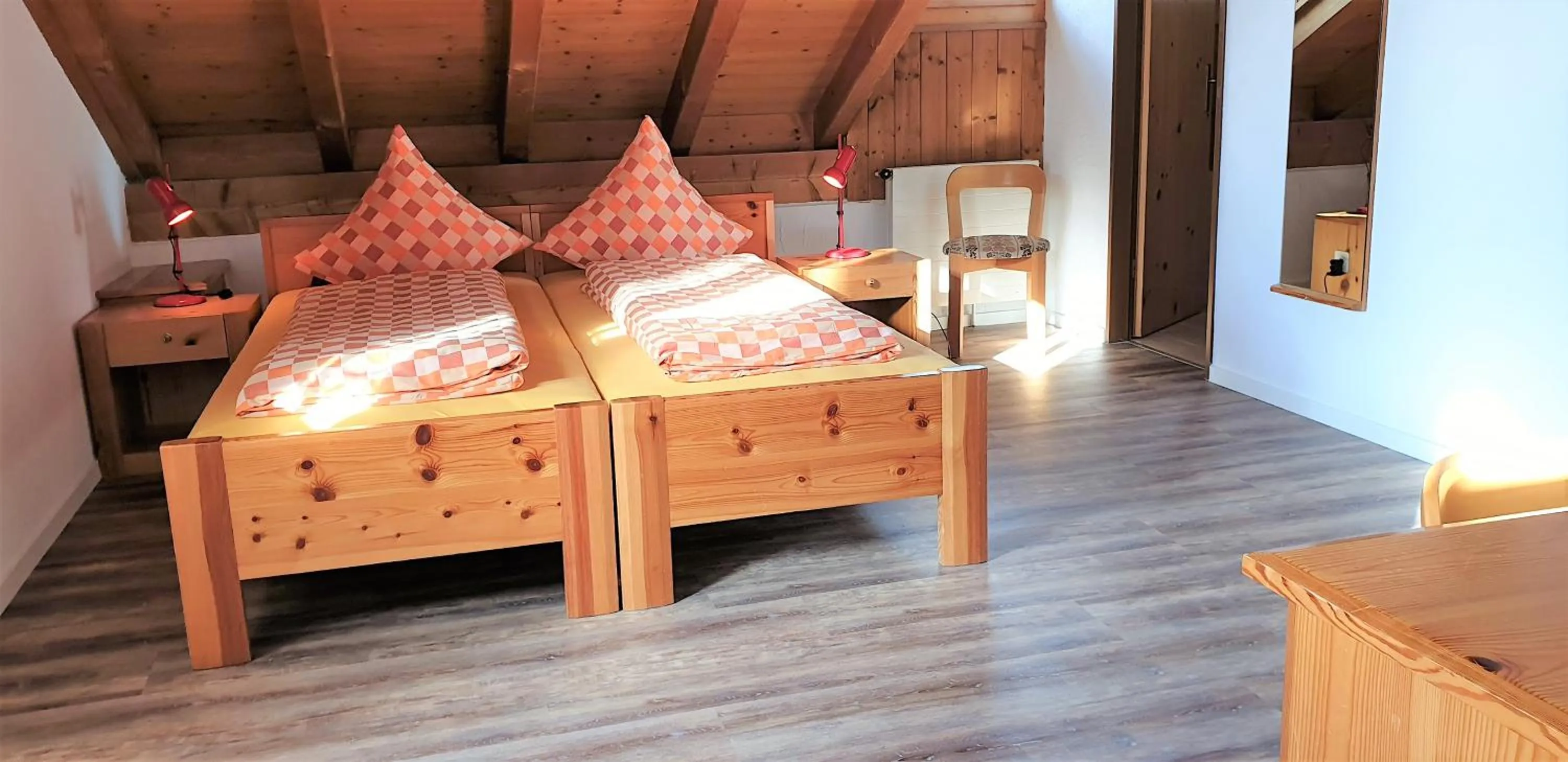 Decorative detail, Bed in Hotel Gravas Lodge - Das Hotel für Gäste mit Hund