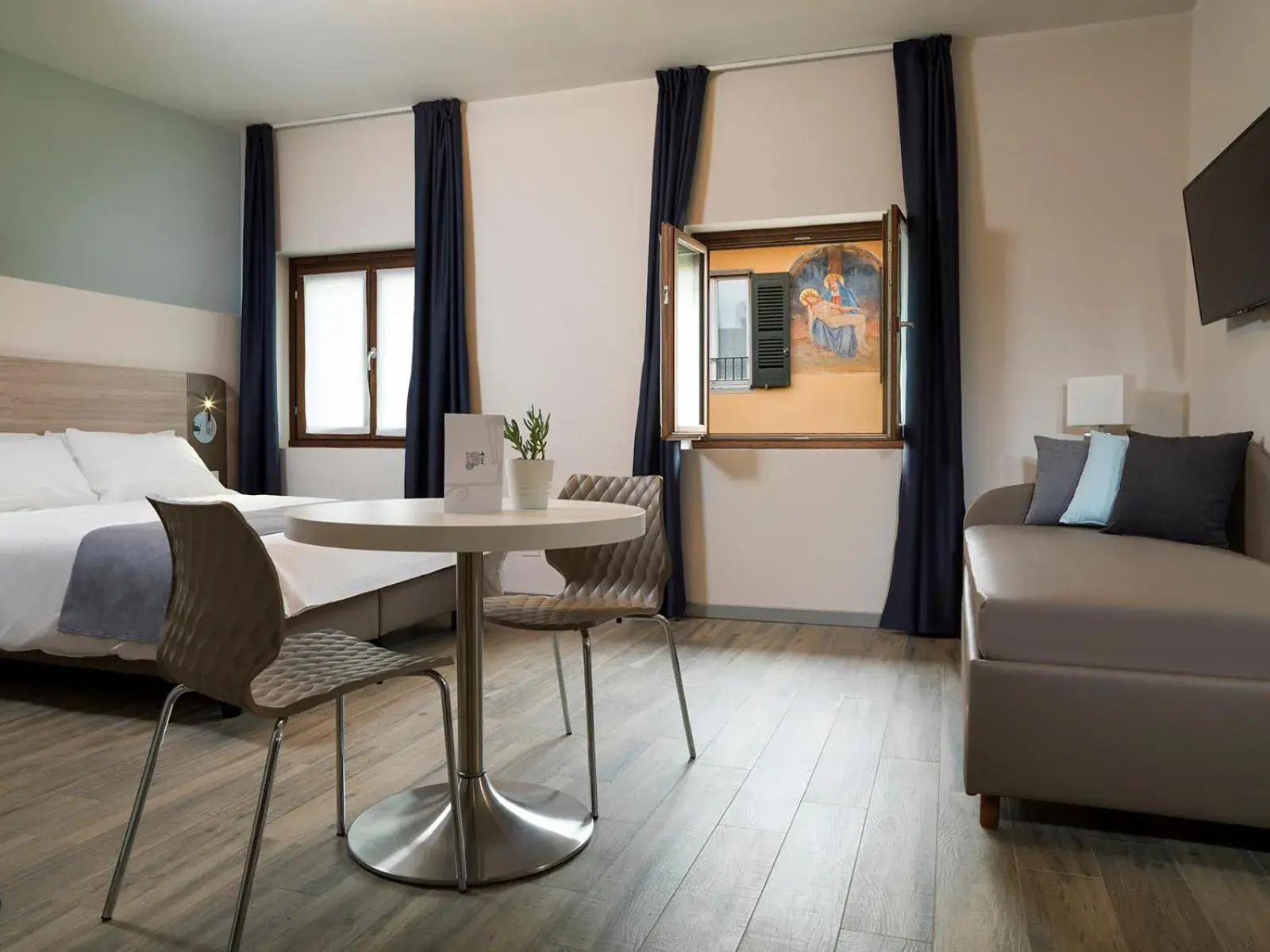 Standard Quadruple Room - single occupancy in Residenza del Borgo Standard Quadruple Room - single occupancy in Residenza del Borgo