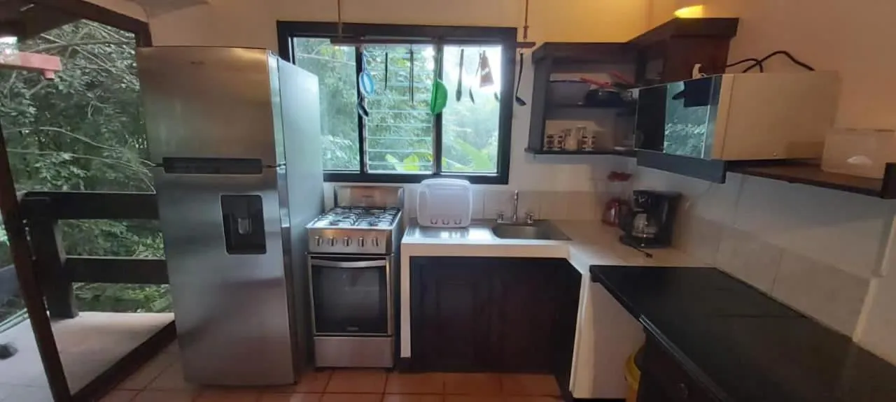 Kitchen or kitchenette in Massai Apartments