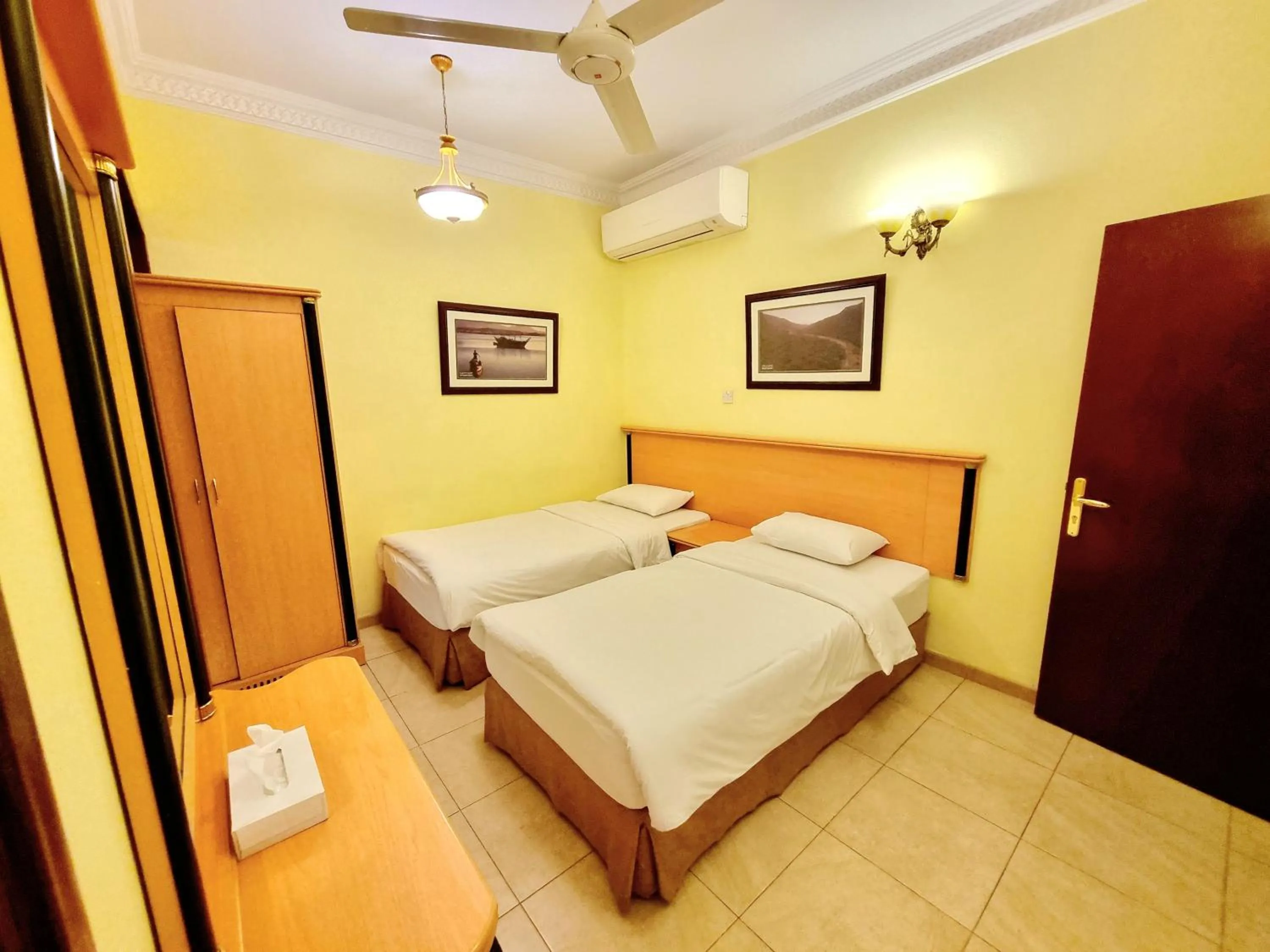 Bed in Muscat International Hotel