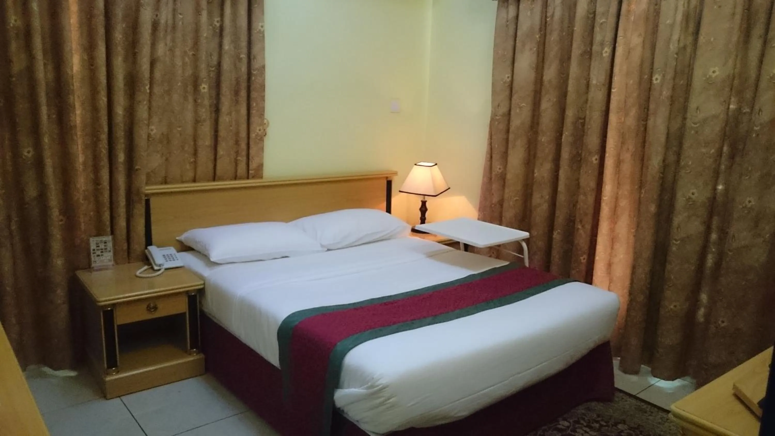 Bed in Muscat International Hotel