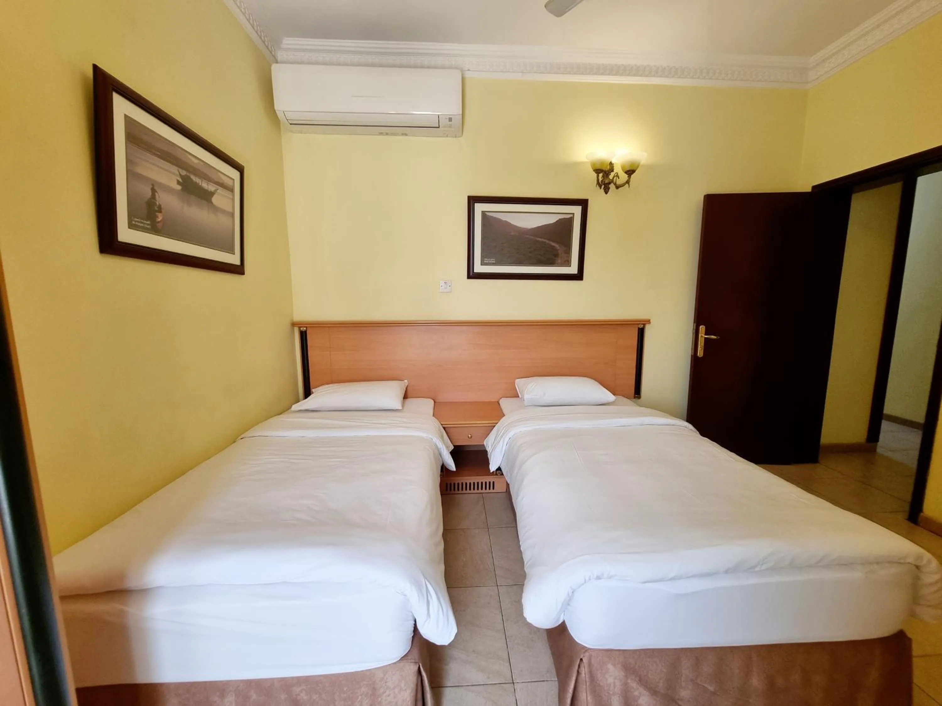 Bed in Muscat International Hotel