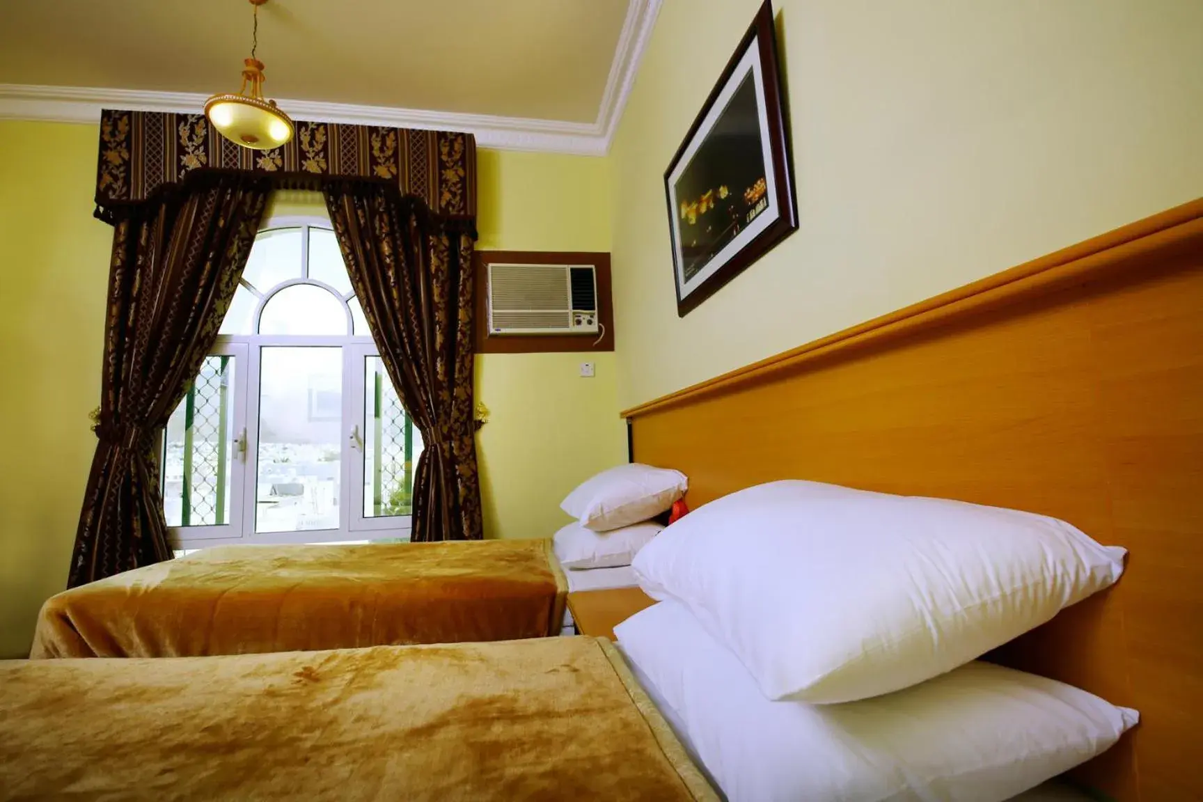 Bed in Muscat International Hotel Bed in Muscat International Hotel