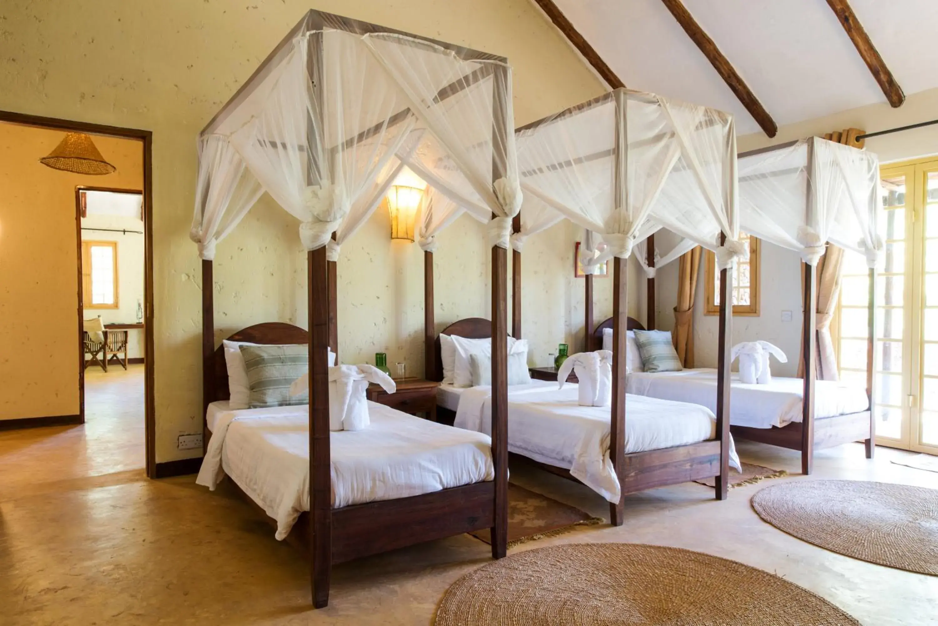 Bed in Kili Villa Kilimanjaro Luxury Retreat Bed in Kili Villa Kilimanjaro Luxury Retreat