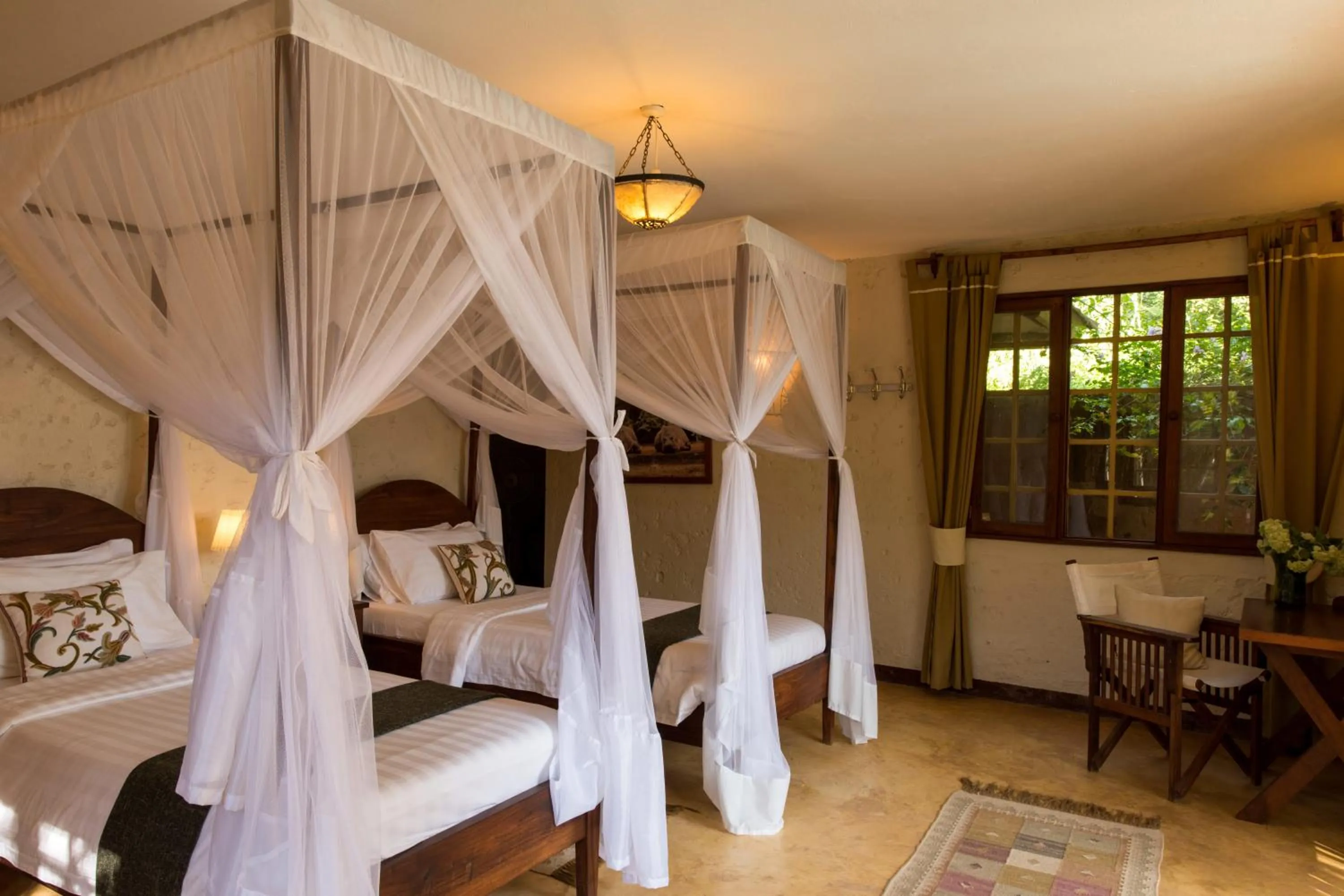 Photo of the whole room, Bed in Kili Villa Kilimanjaro Luxury Retreat
