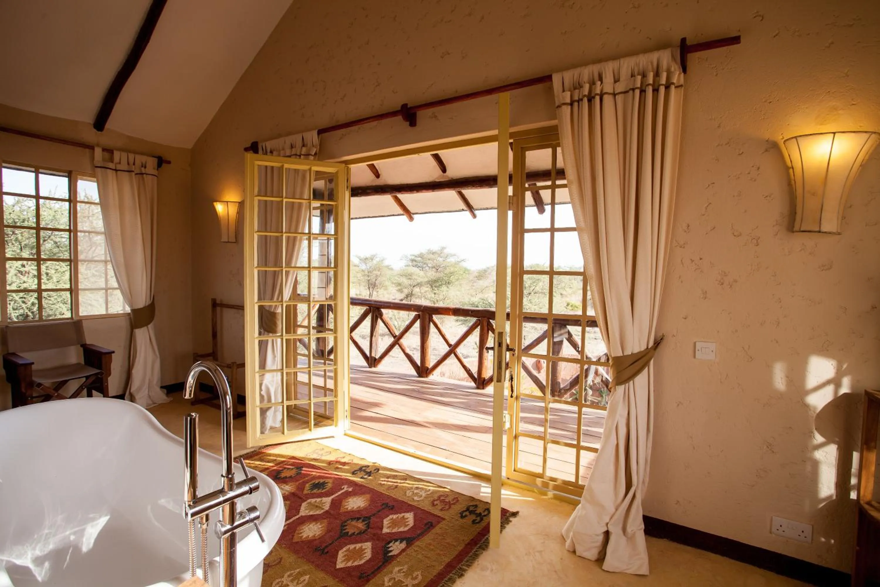 Photo of the whole room, Bed in Kili Villa Kilimanjaro Luxury Retreat