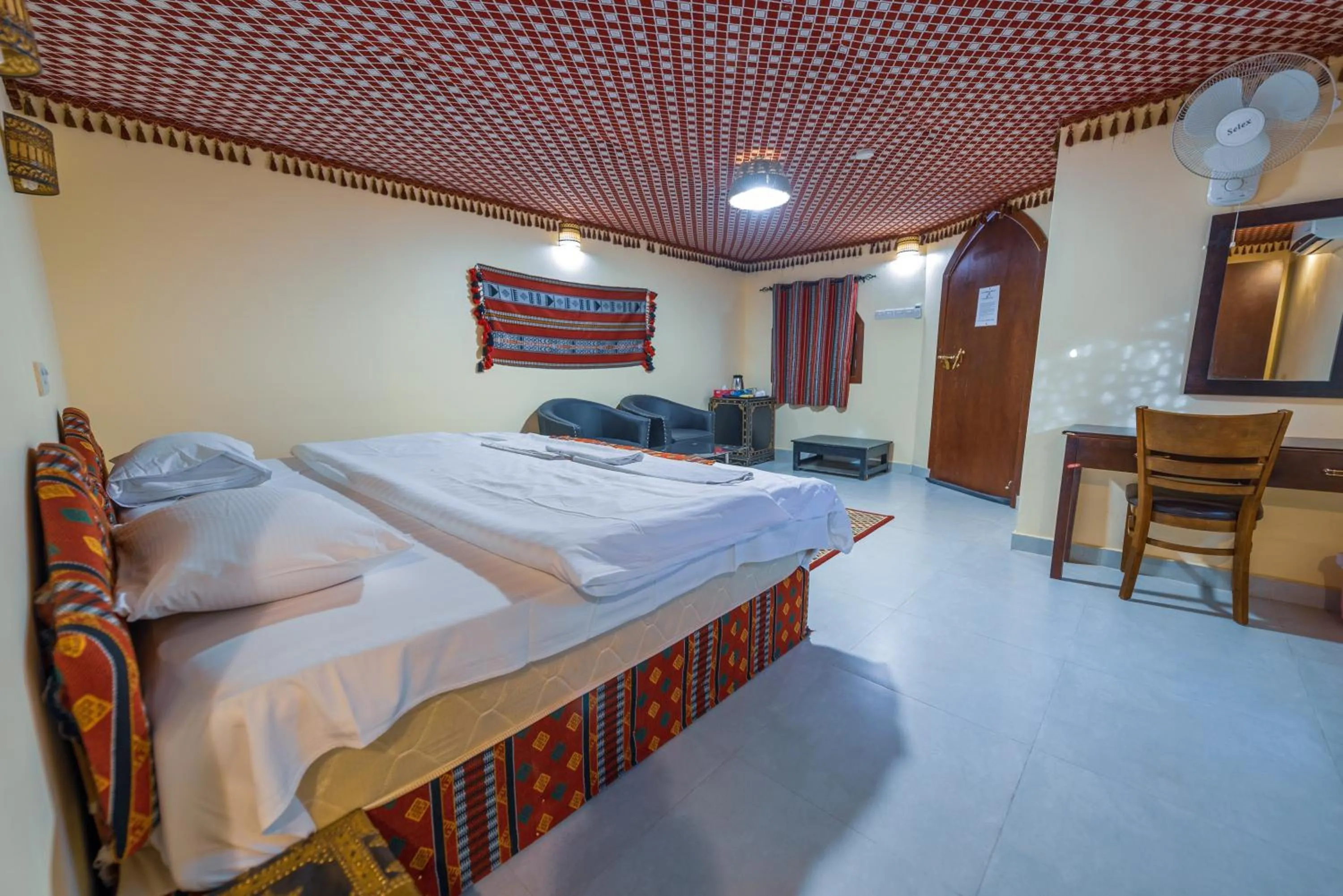 Photo of the whole room, Bed in Arabian Oryx Camp