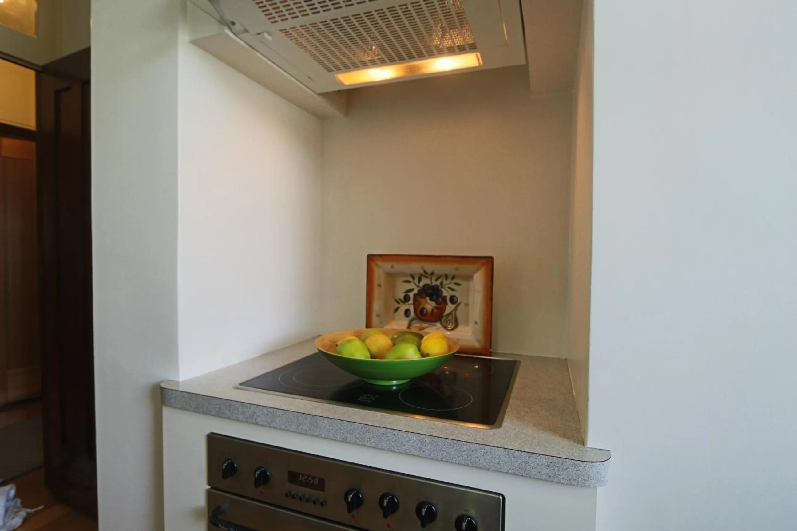 Kitchen or kitchenette in Moonah Central Apartments