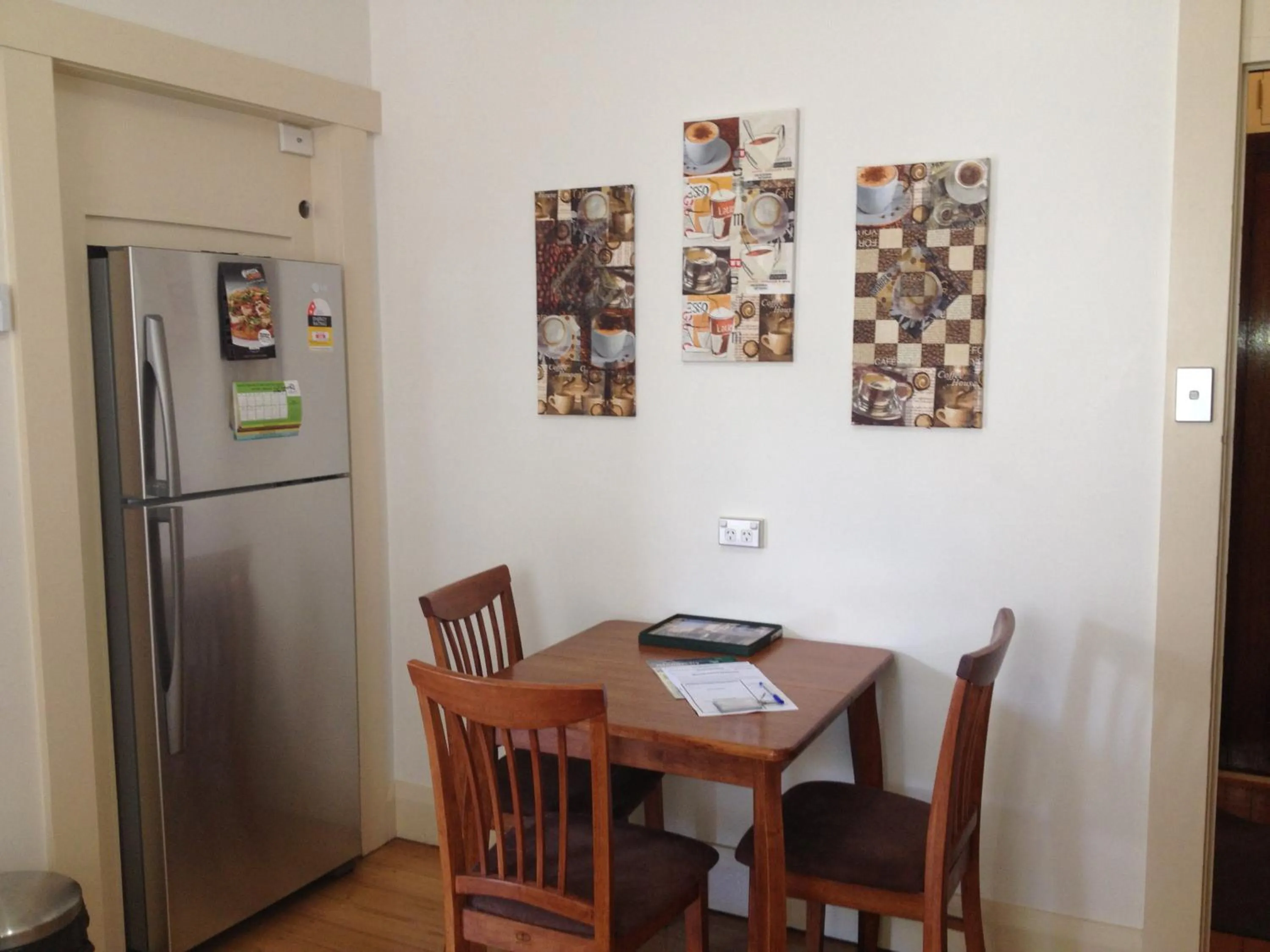 Kitchen or kitchenette in Moonah Central Apartments