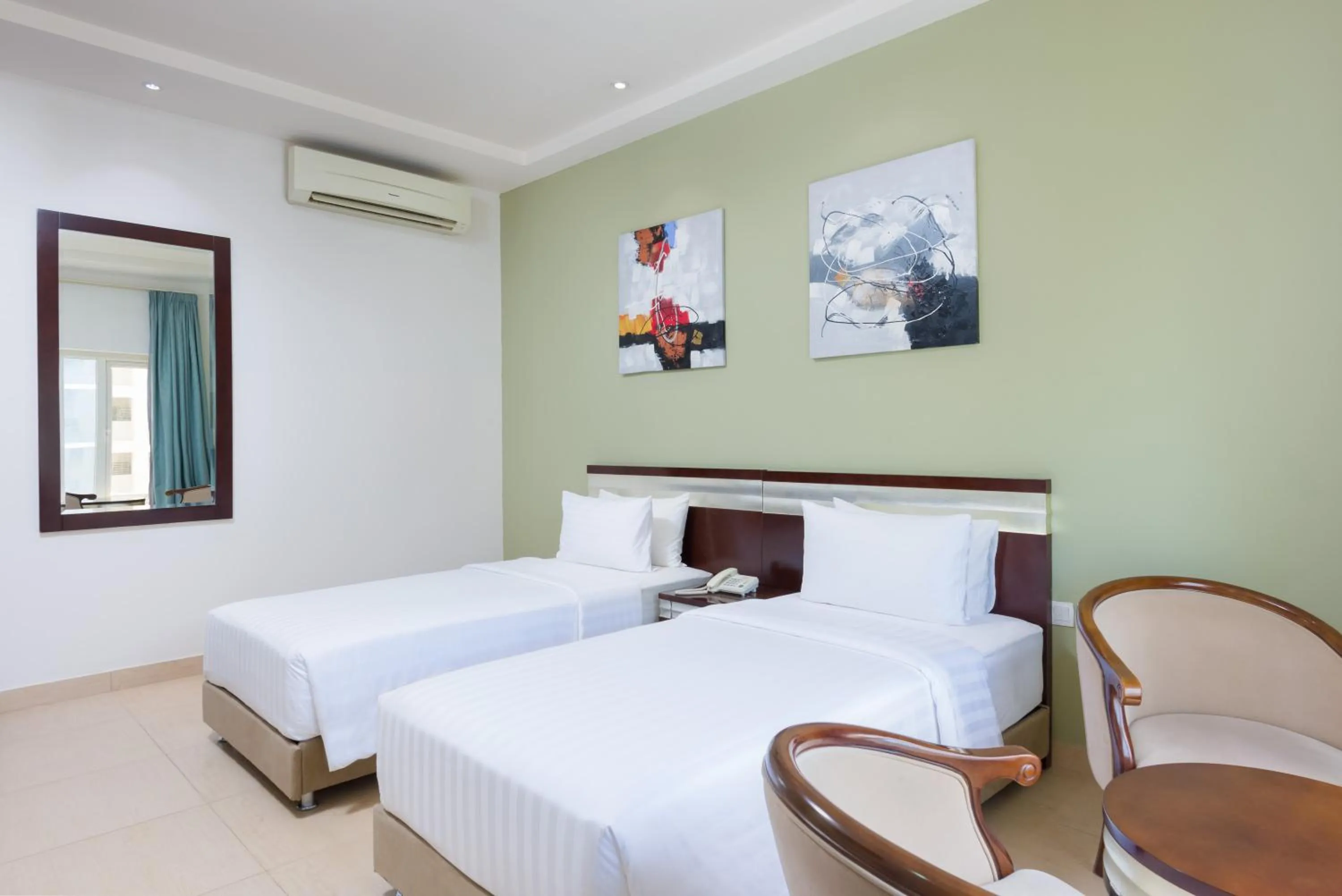 Bedroom in Centara Life Muscat Dunes Hotel