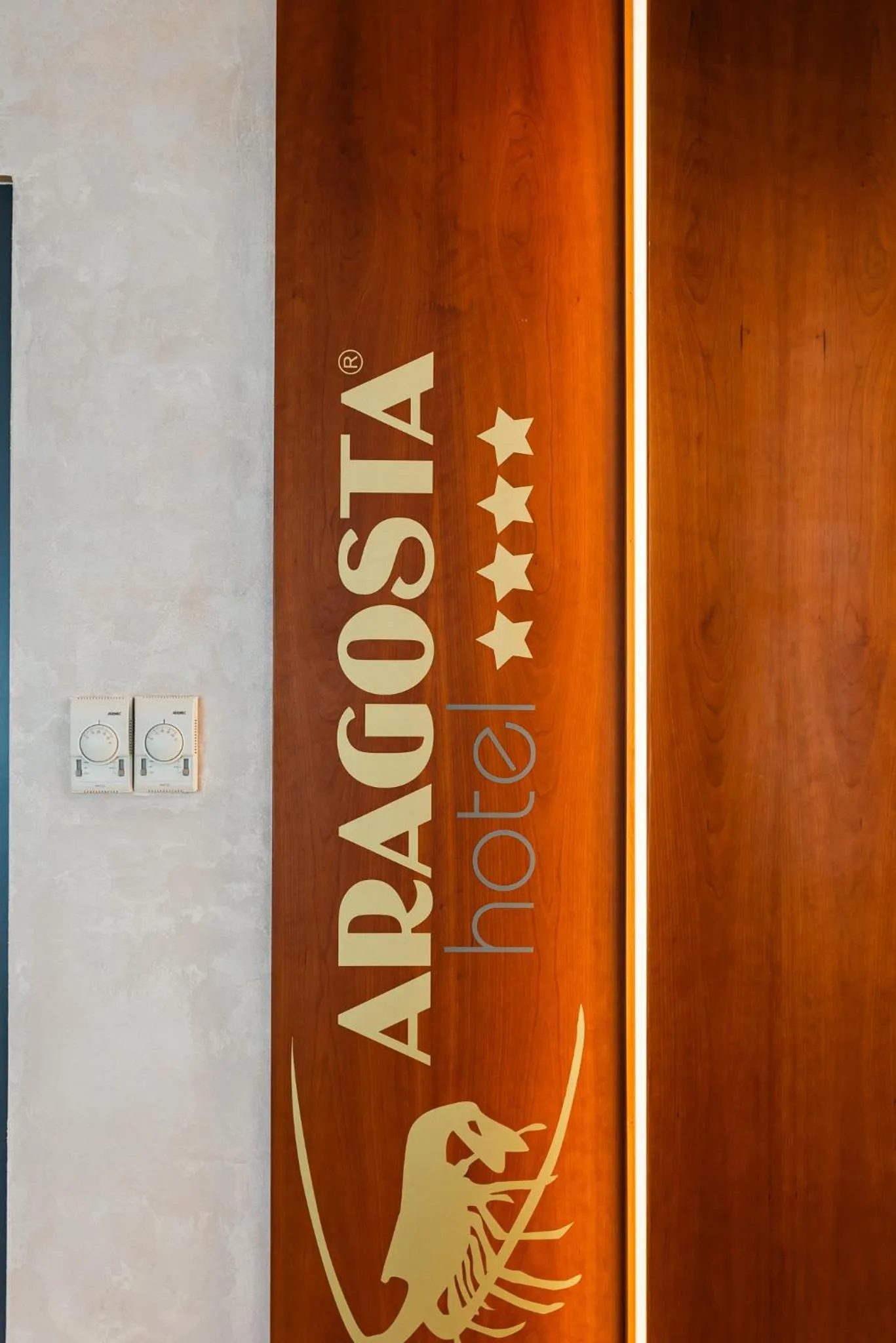 Property logo or sign in Aragosta Hotel