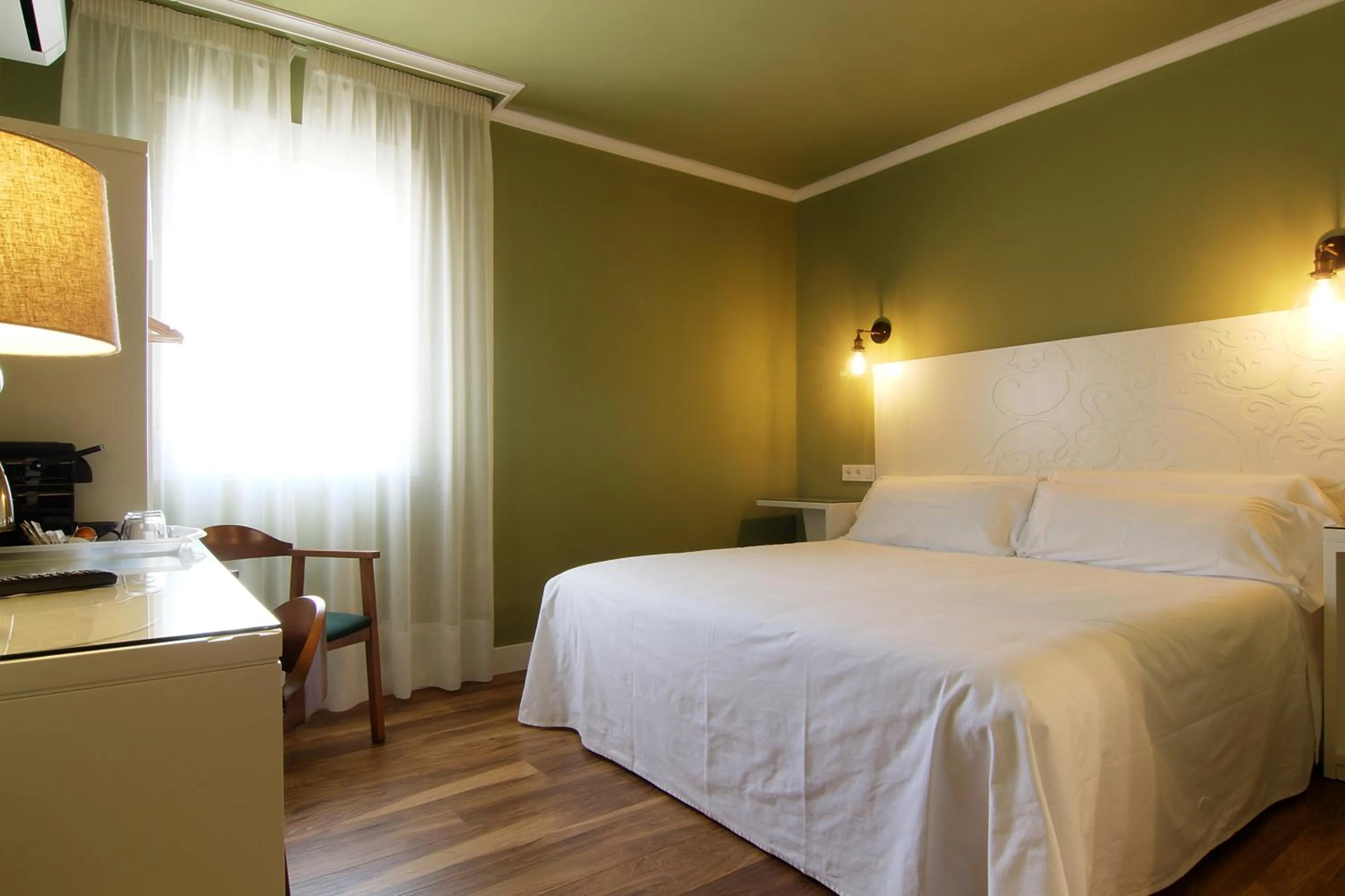 Bed in Hostal Los Castañuelos