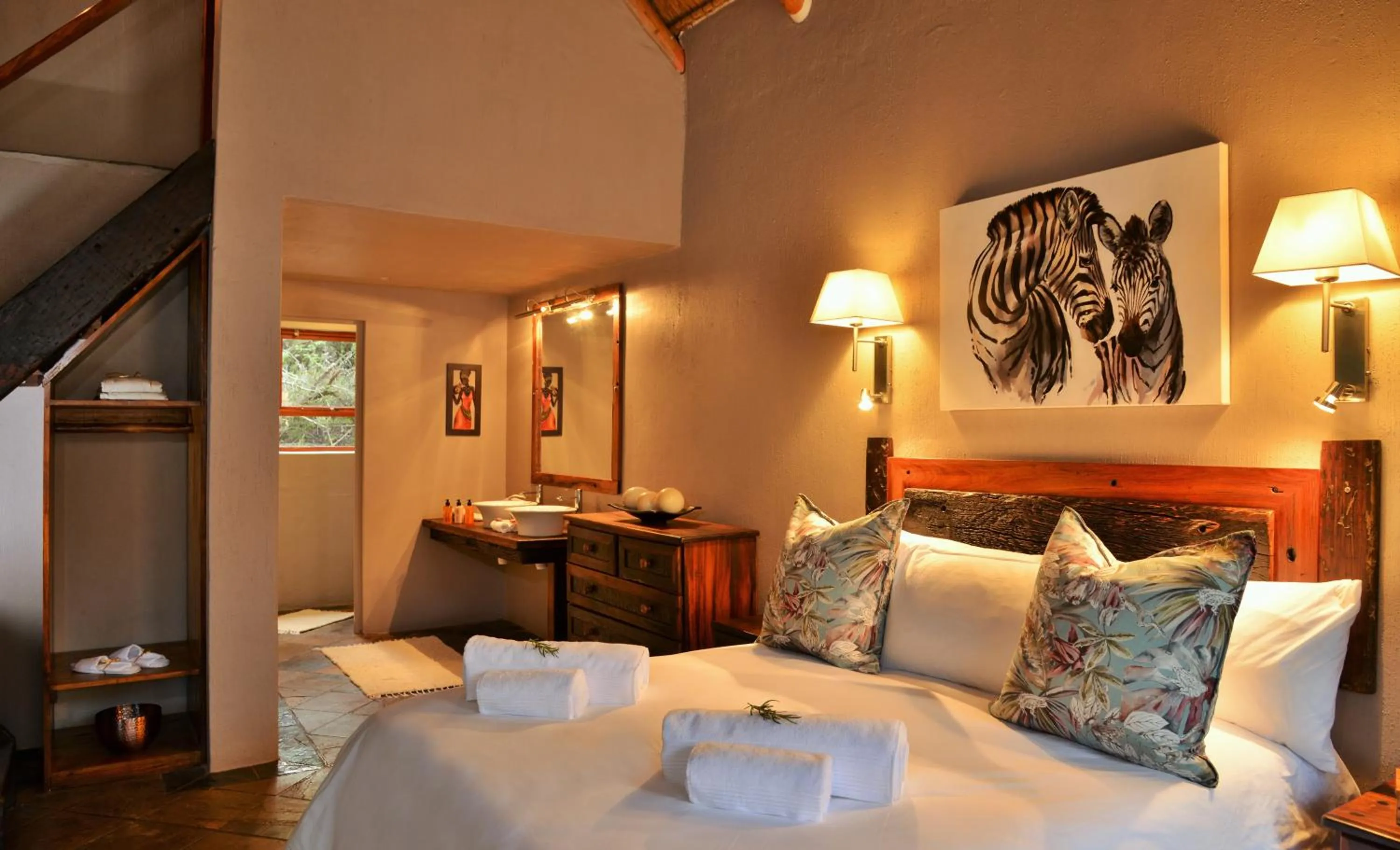Bed in Garden Route Safari Camp