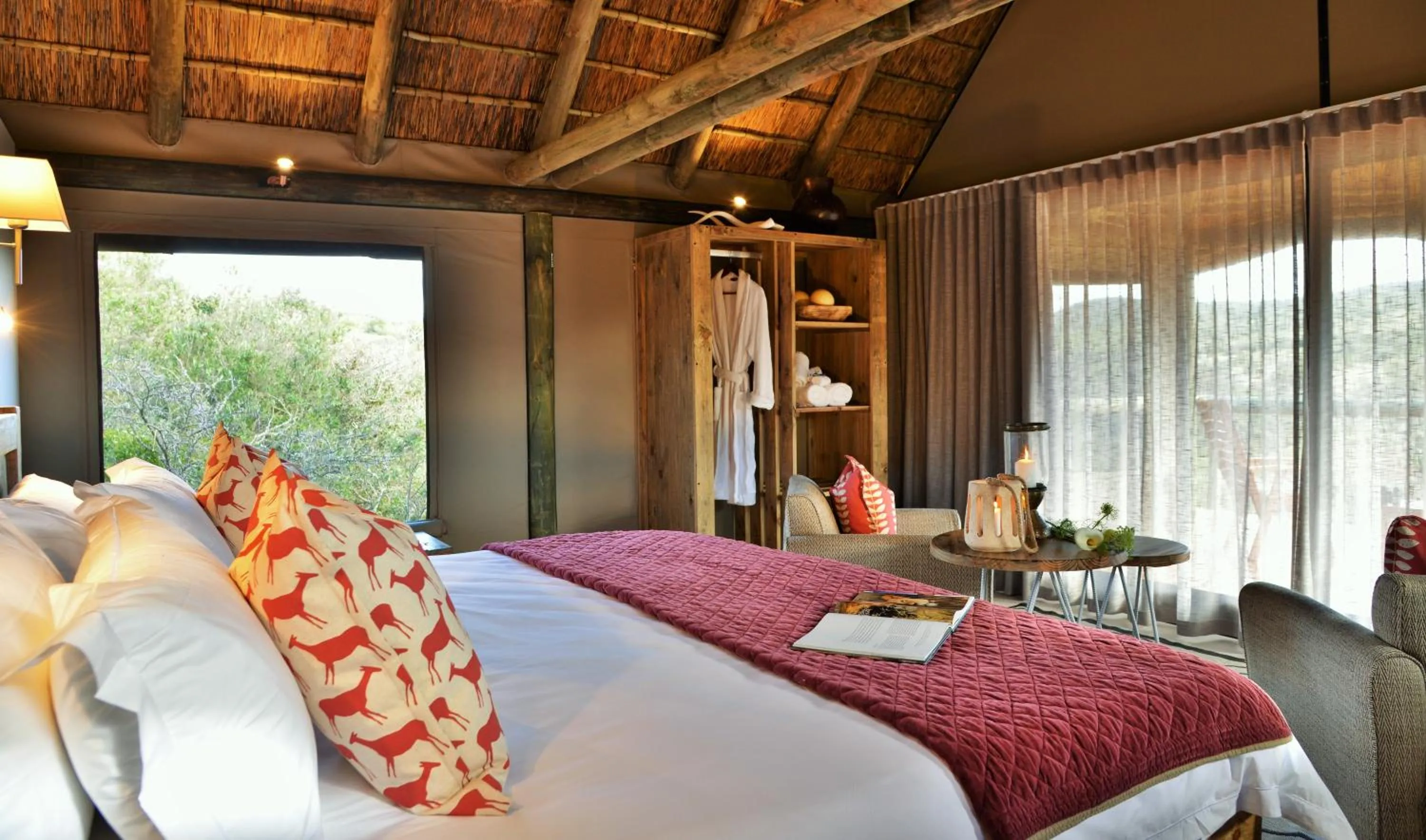 Bed in Garden Route Safari Camp