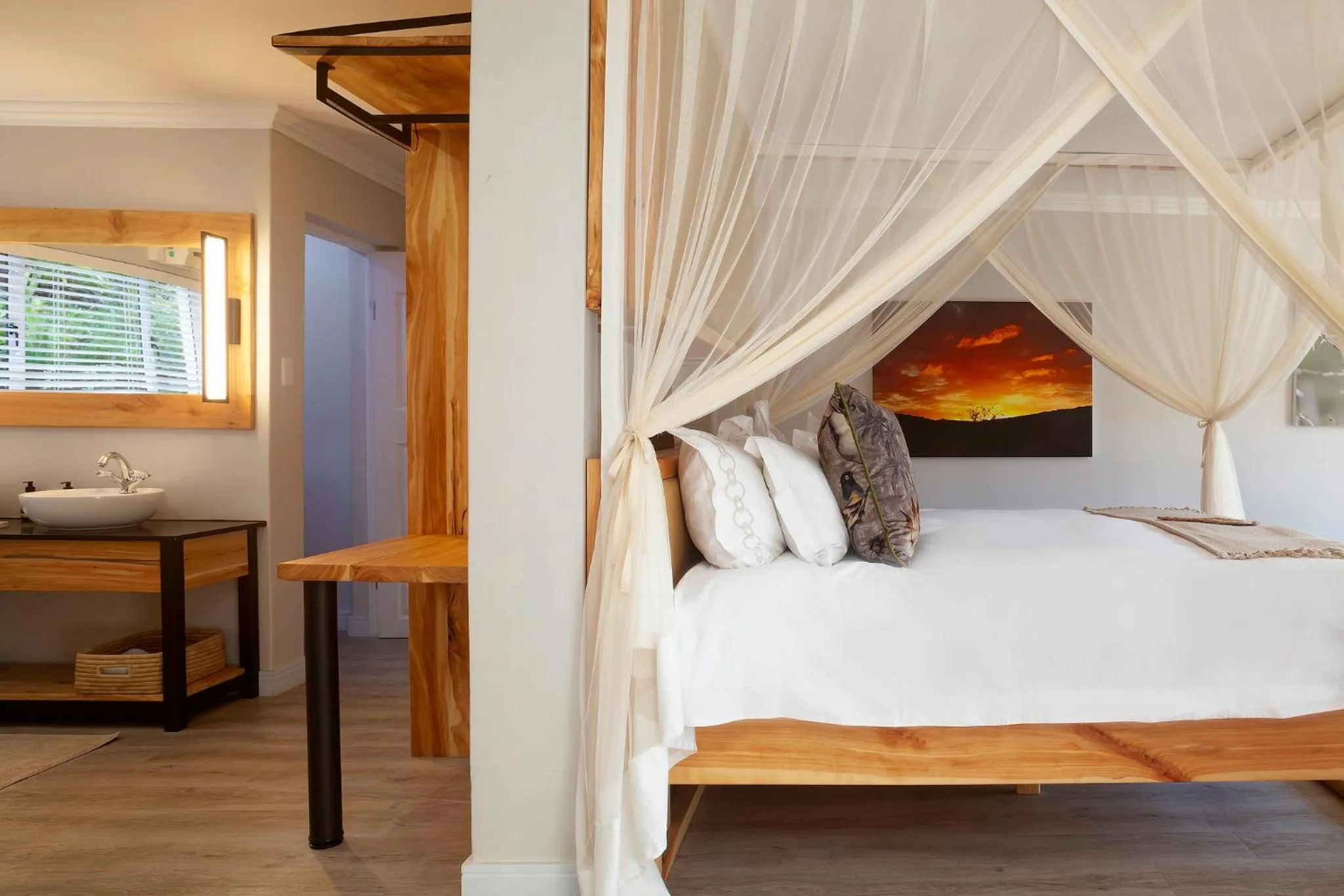 Bed in Garden Route Safari Camp