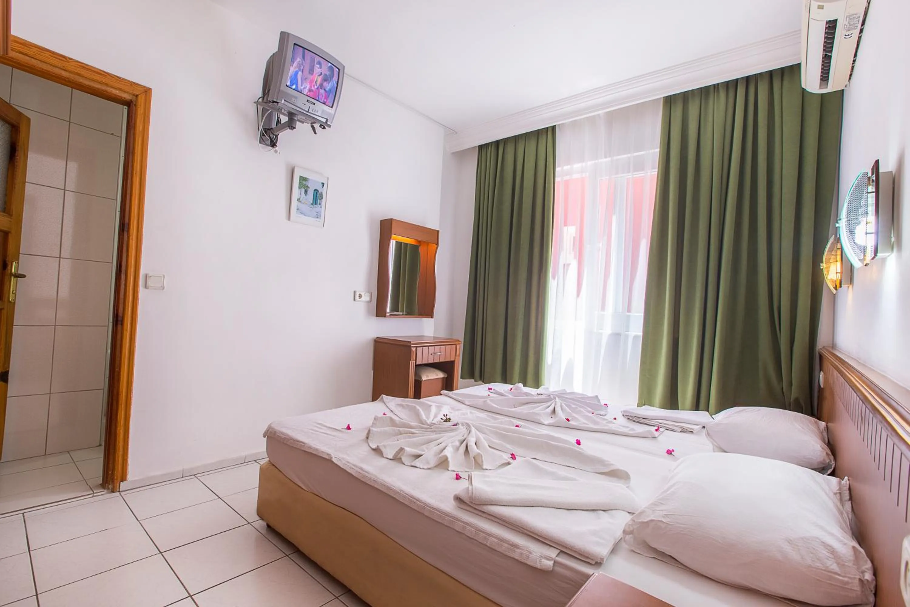 Bed in Bayram Apart Hotel