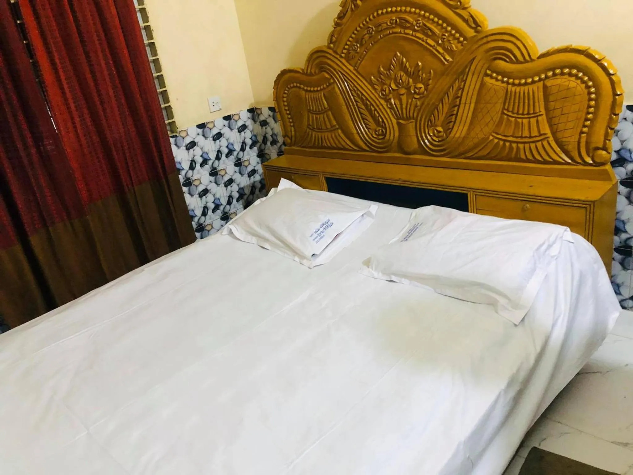 Bed in Hotel Regal Palace