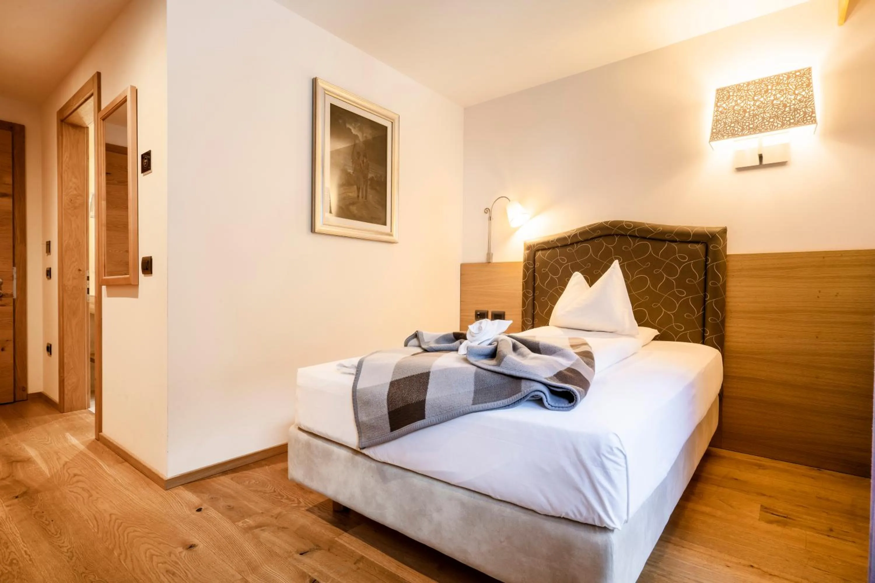 Bed in Hotel Cesa Tyrol