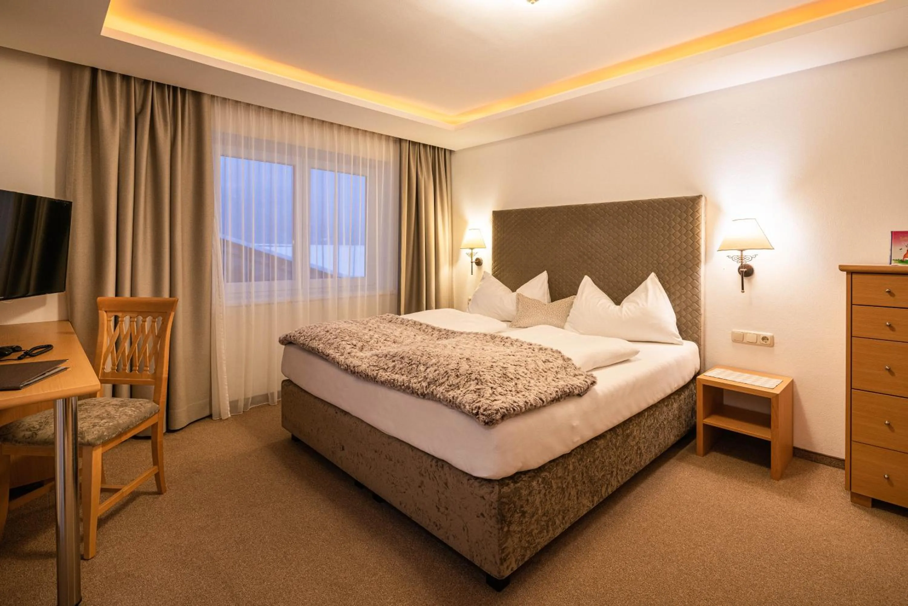 Bed in Hotel Hubertus