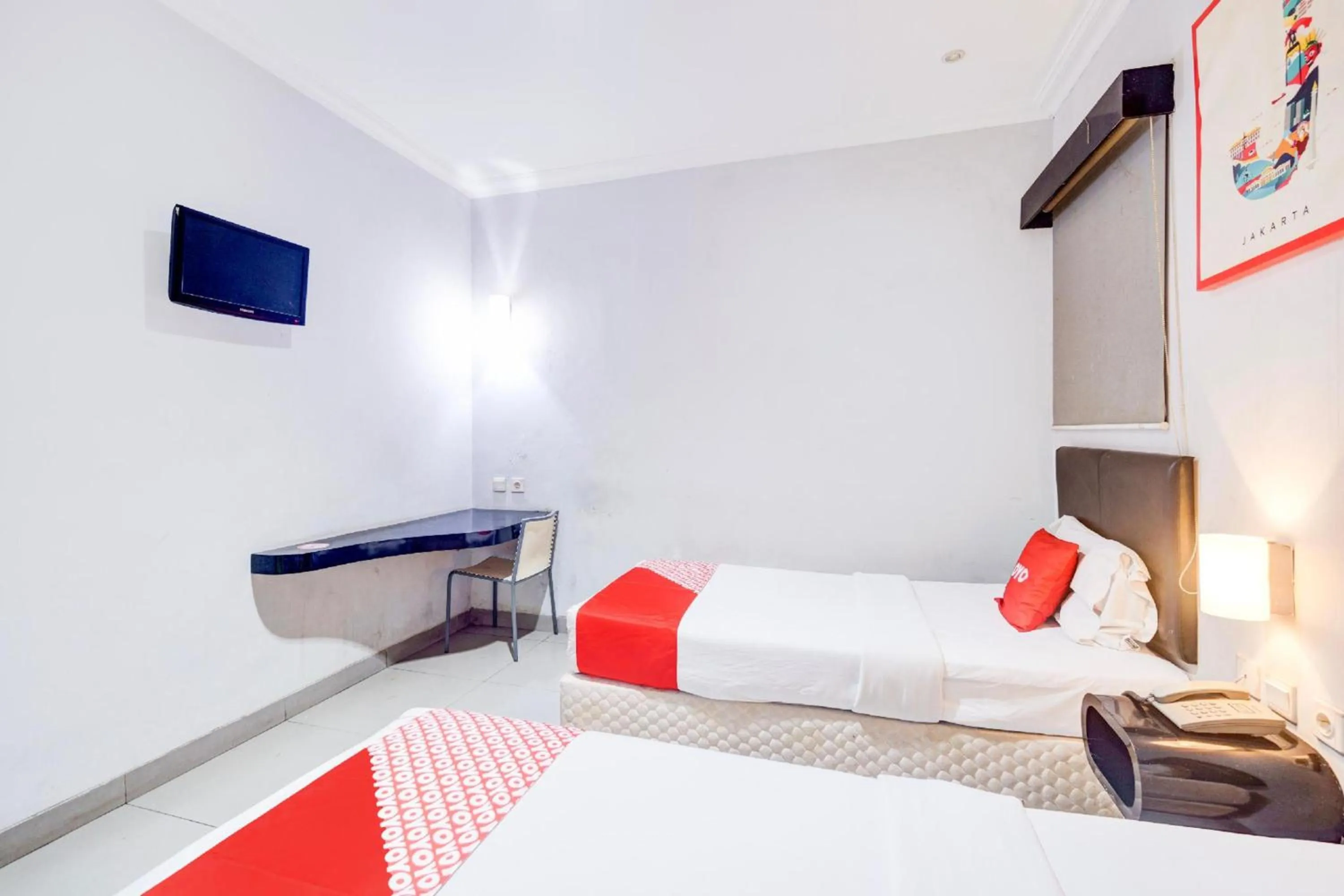 Bedroom in Collection O Manggis Inn