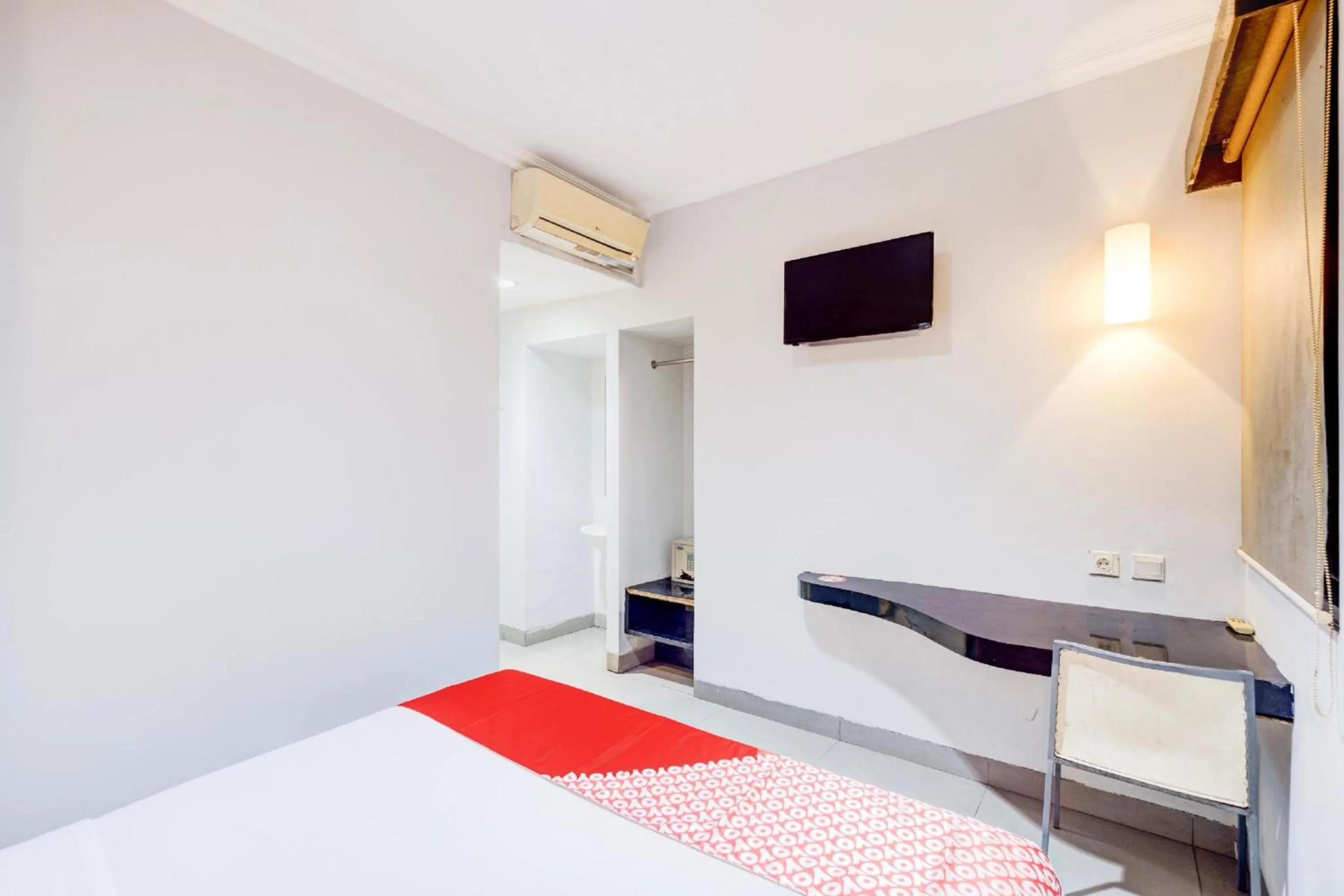 Bedroom in Collection O Manggis Inn