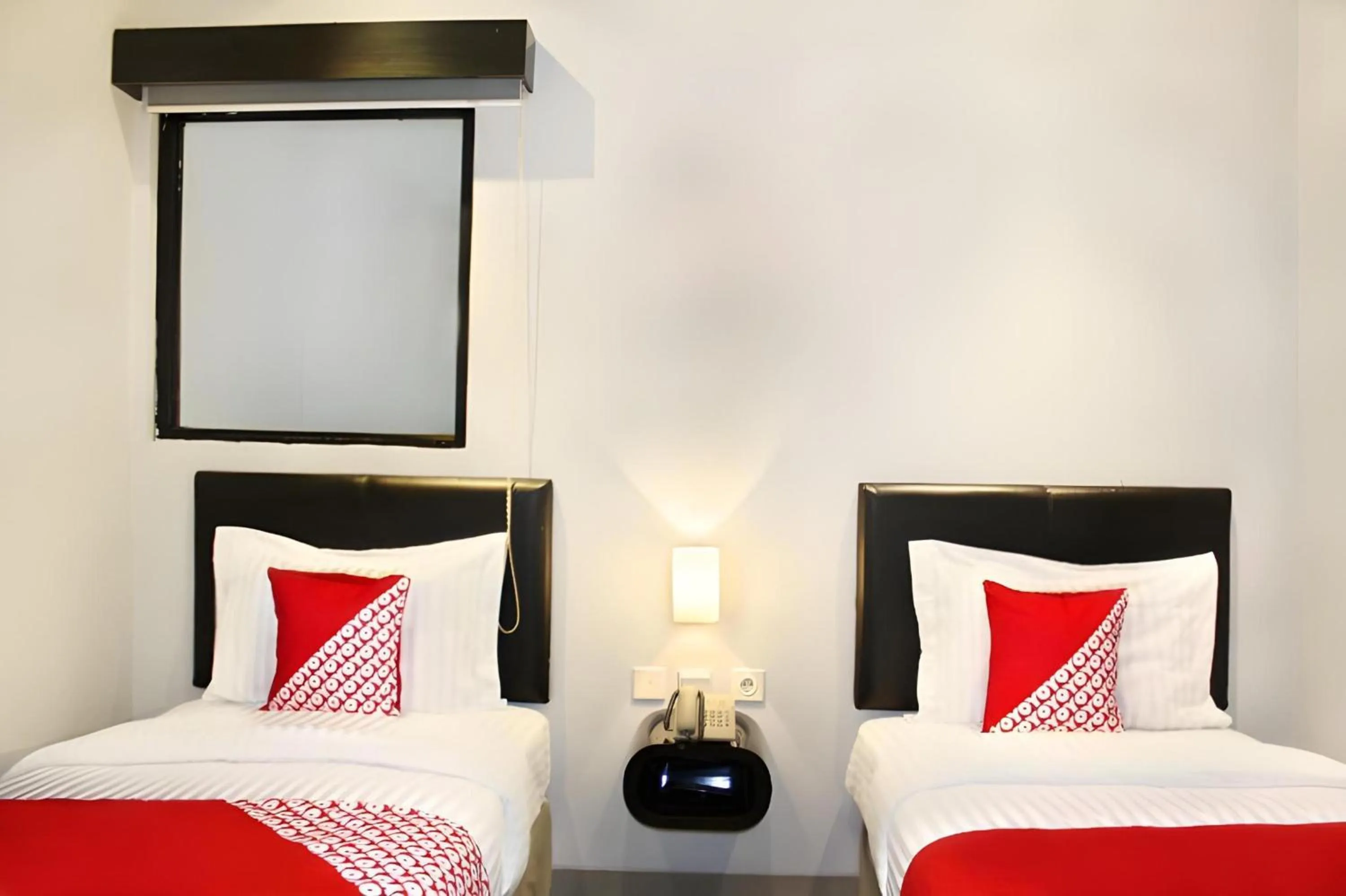 Photo of the whole room in Collection O Manggis Inn