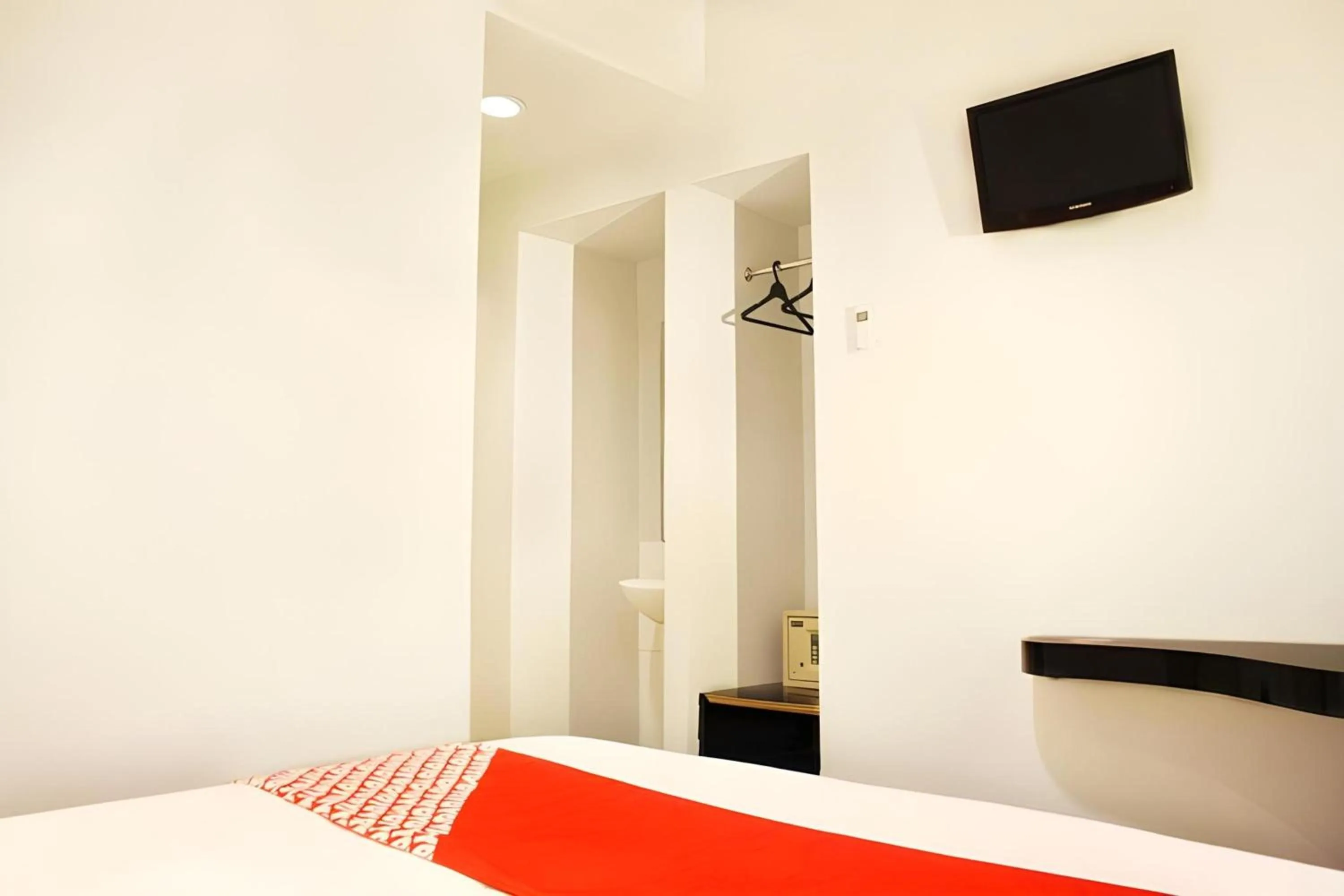 Photo of the whole room in Collection O Manggis Inn