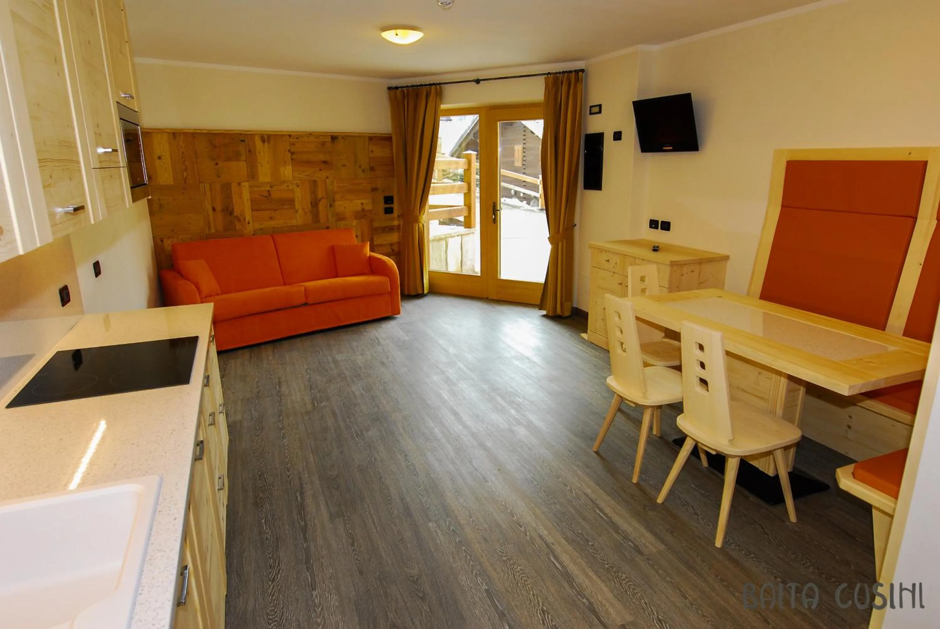 Living room in Residence Baita Cusini