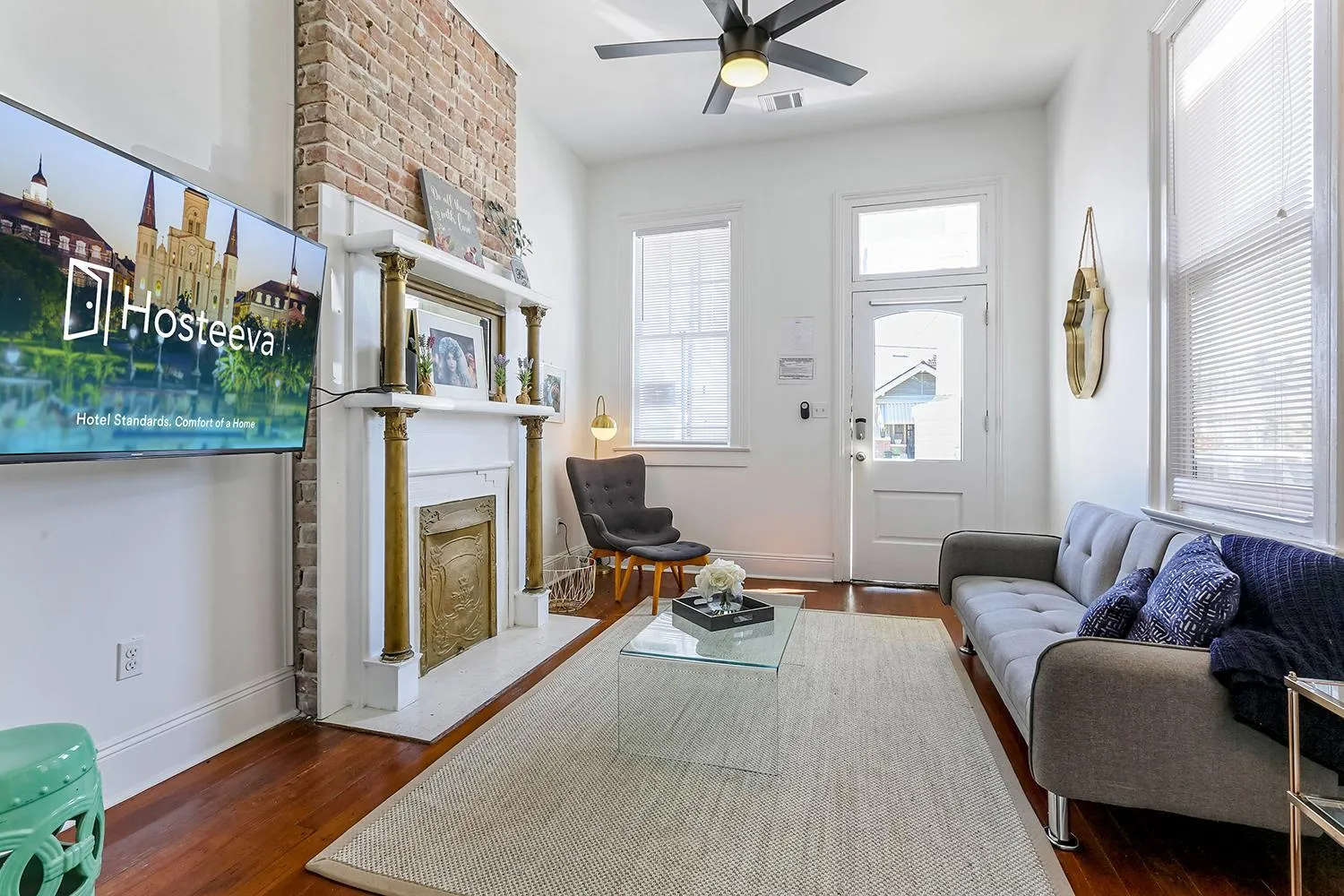 Living room in Private 2BR in Uptown by Hosteeva