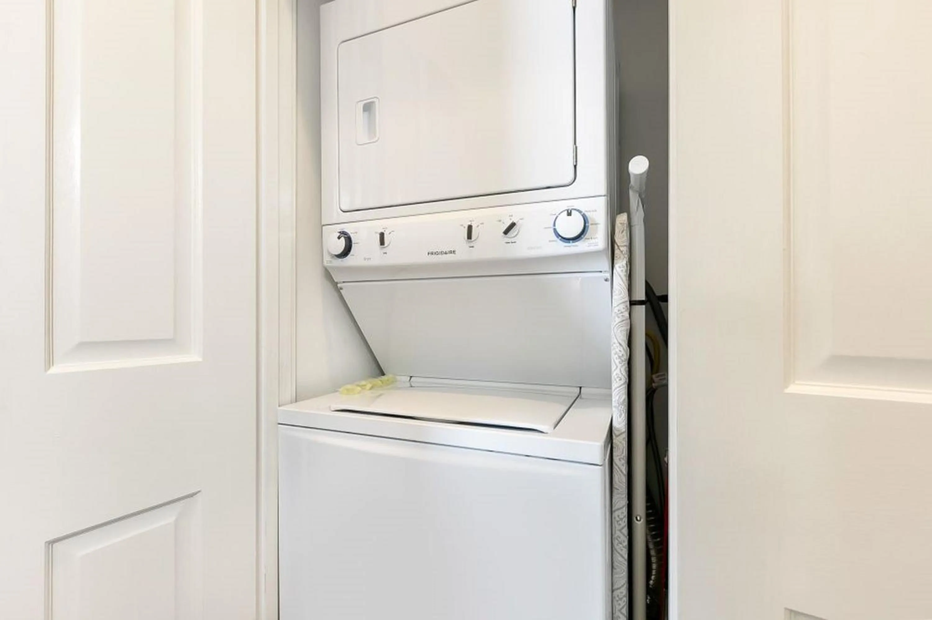 laundry in Private 2BR in Uptown by Hosteeva