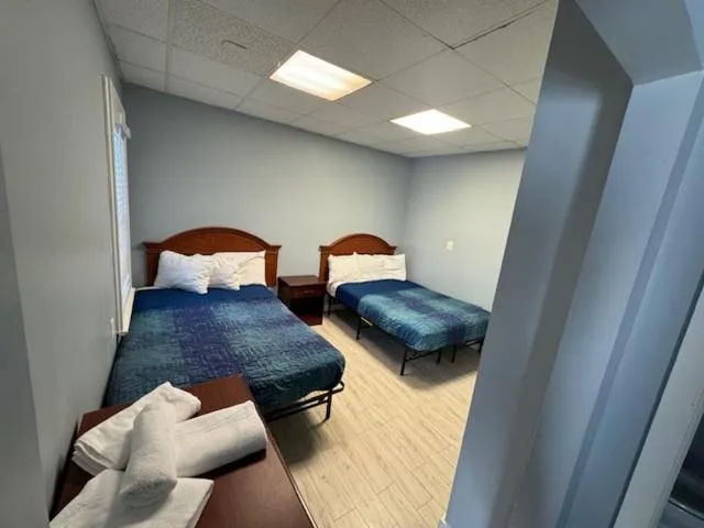 Bed in Hammock Inn & Suites North Beach Hotel