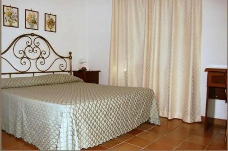 Bed in Albergo Belvedere