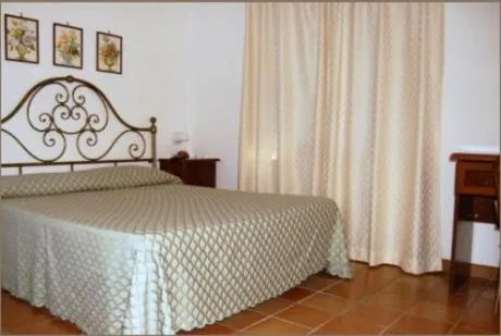 Bed in Albergo Belvedere
