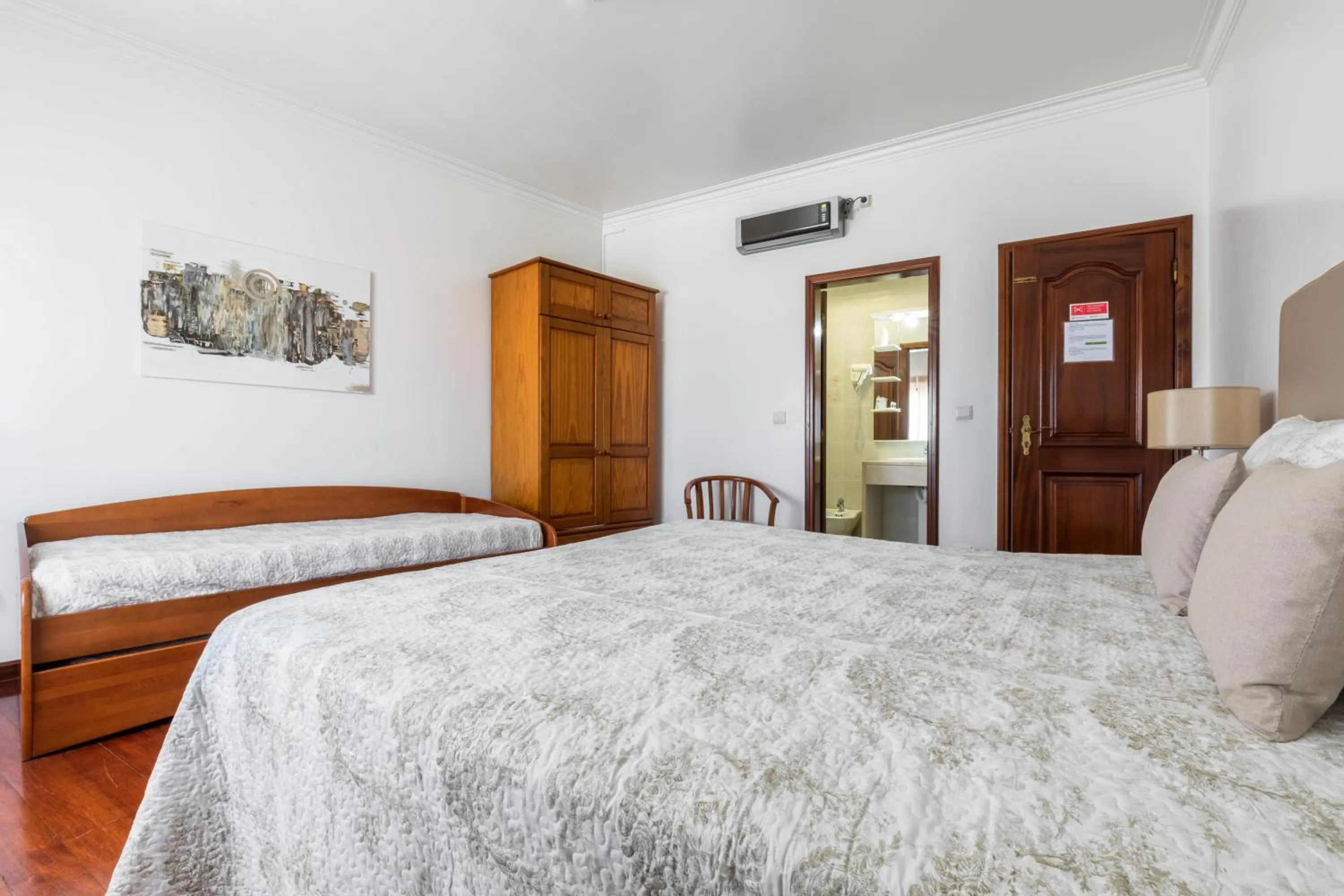 Bed in Residência Maciel