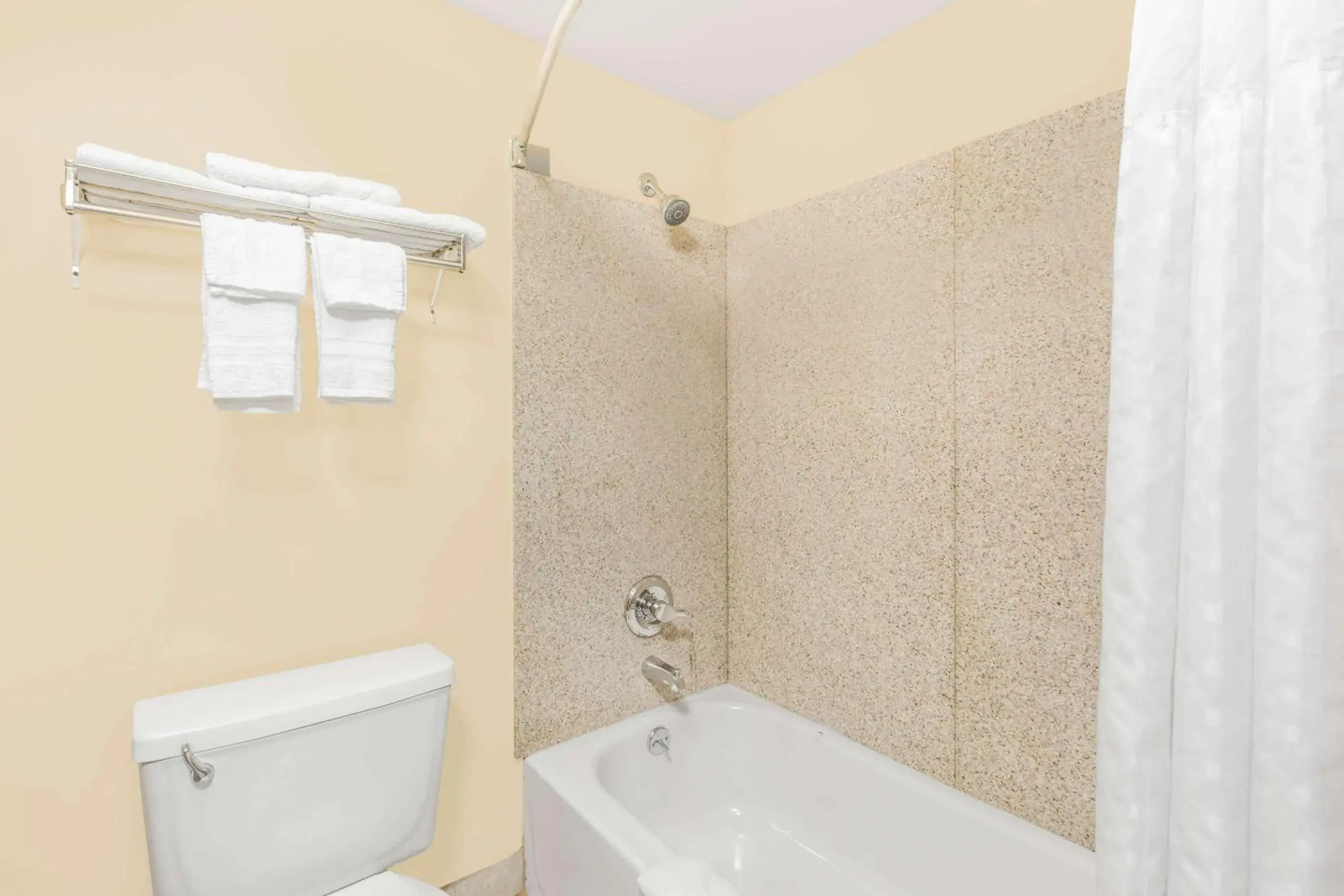 Bathroom in Super 8 by Wyndham Wichita Airport West Kellogg Bathroom in Super 8 by Wyndham Wichita Airport West Kellogg