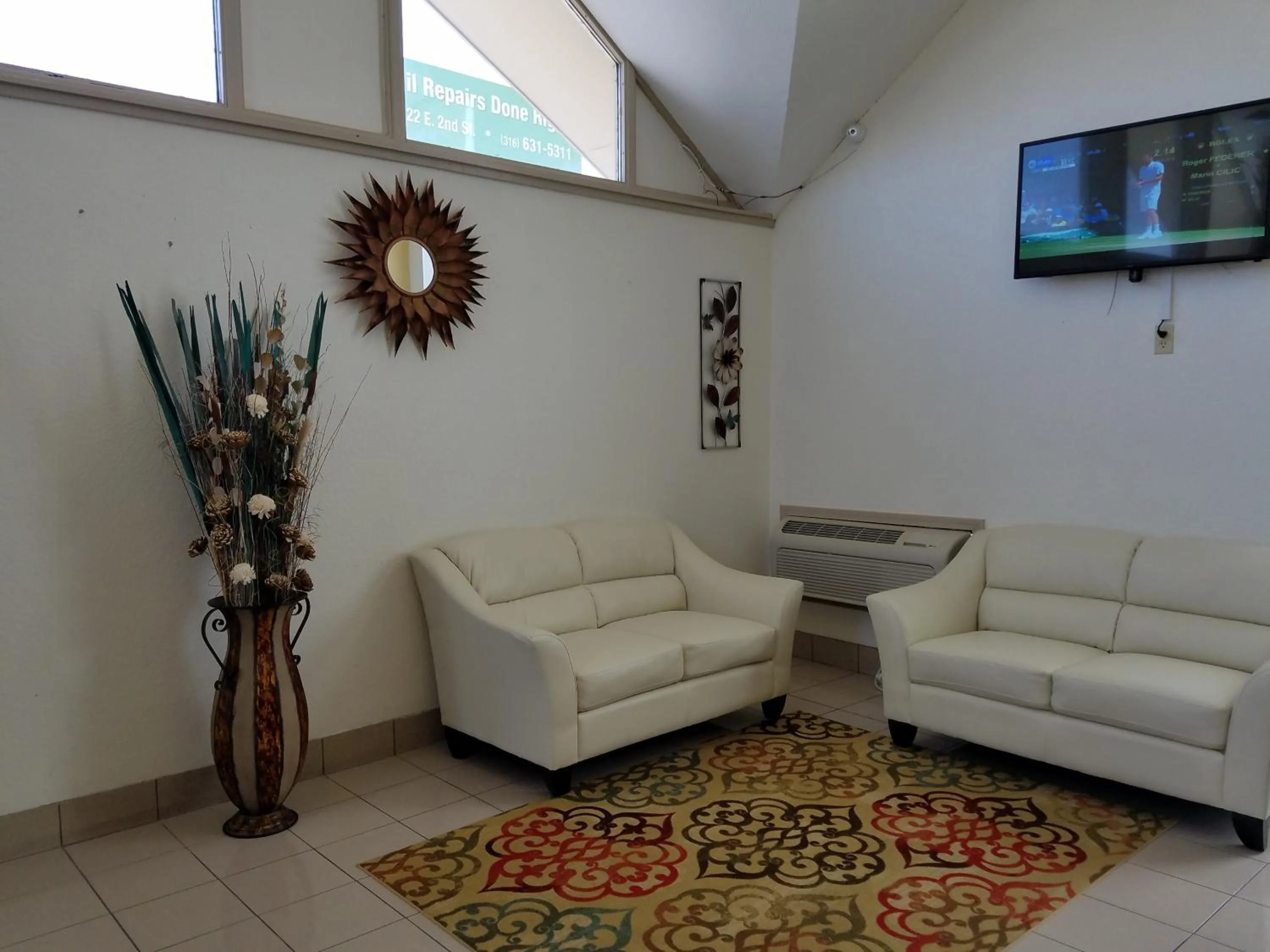 Lobby or reception in Super 8 by Wyndham Wichita Airport West Kellogg