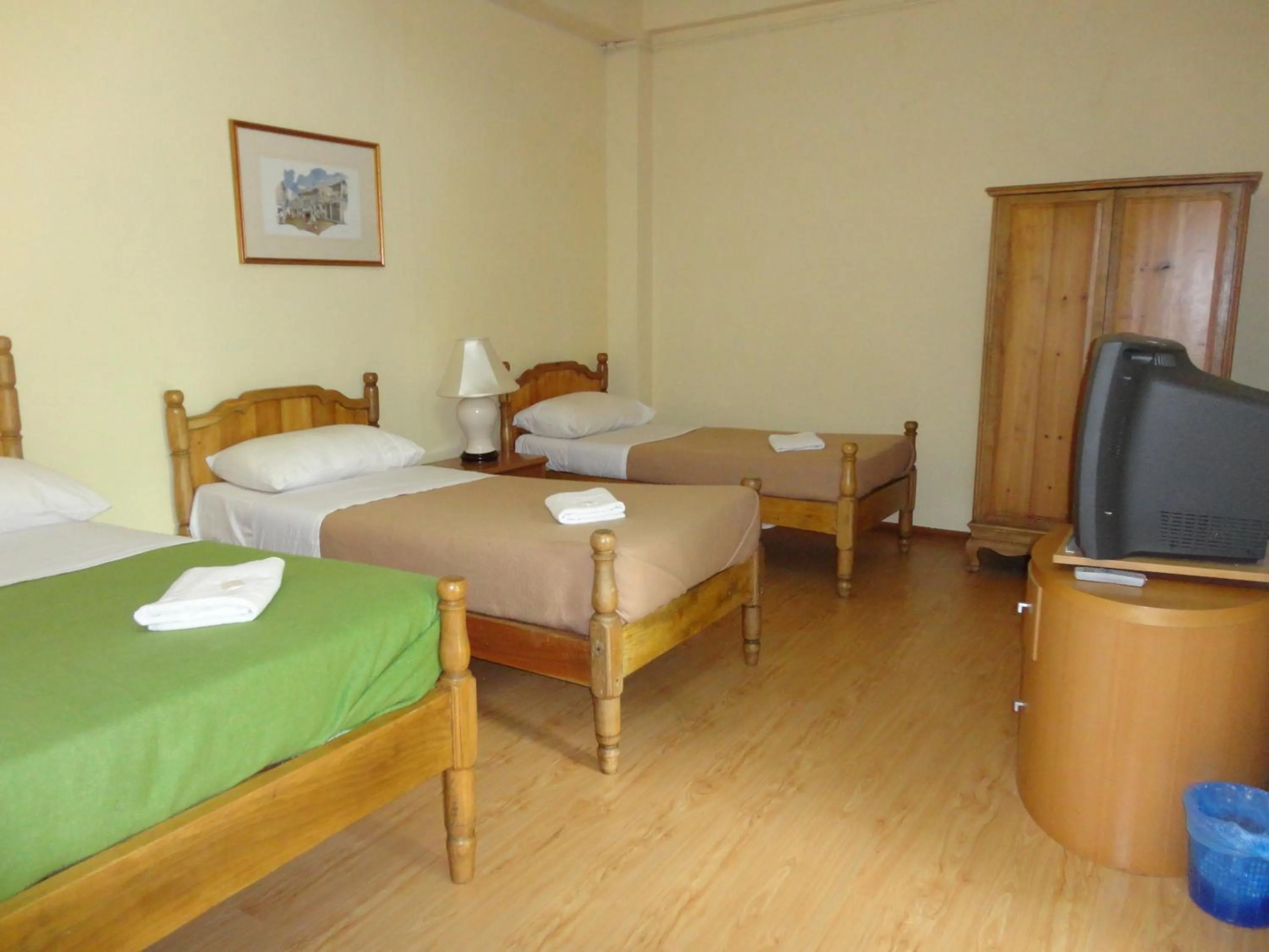 Bed in Pristine Hotel